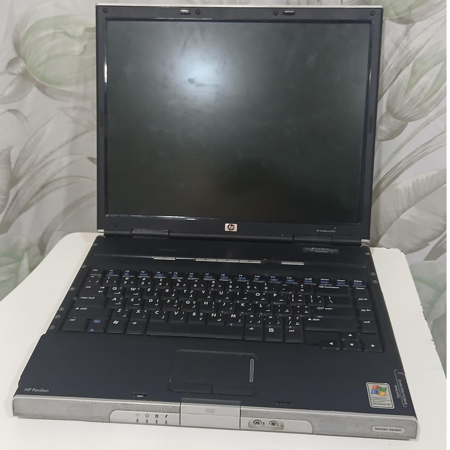 لپ تاپ اچ پی پاویلیون 2000(توضیحات دارد)