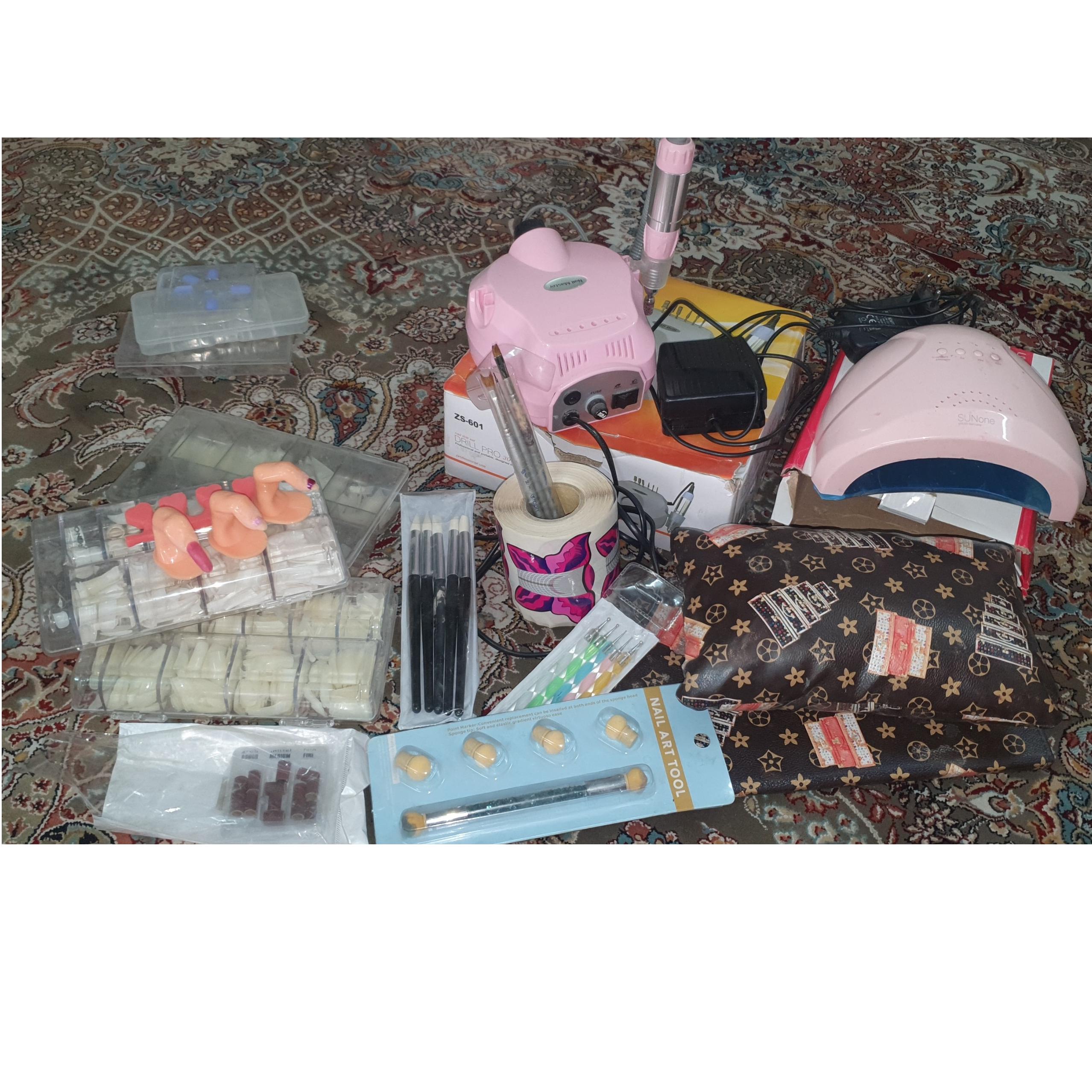 لوازم کاشت ناخن در حد نو