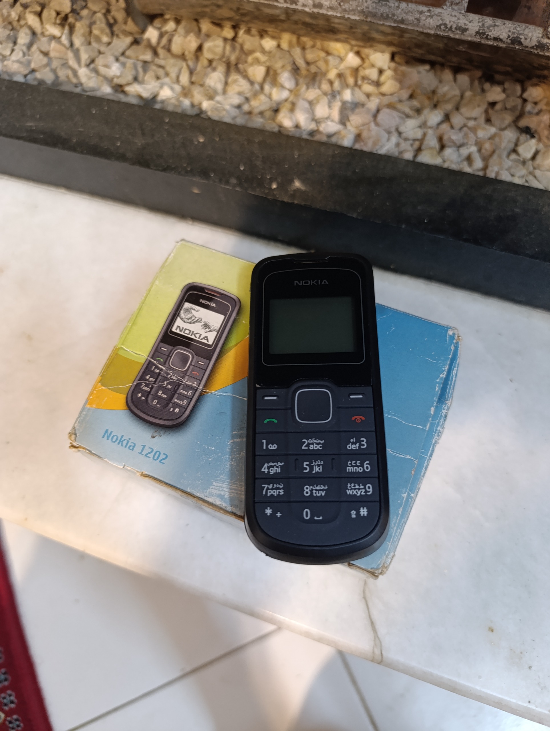 حراج گوشی1202نوکیاتمام فابریک اصلی با متعلقات فول