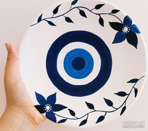 دیوار کوب سفالی