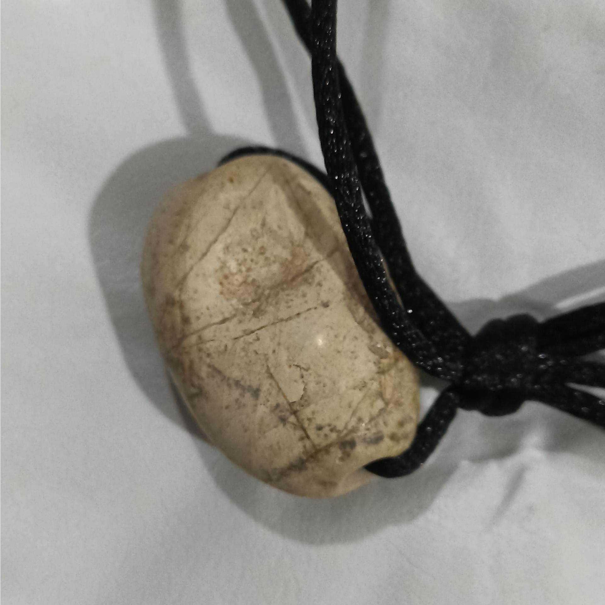 مهره عطف رگه دار کهنه