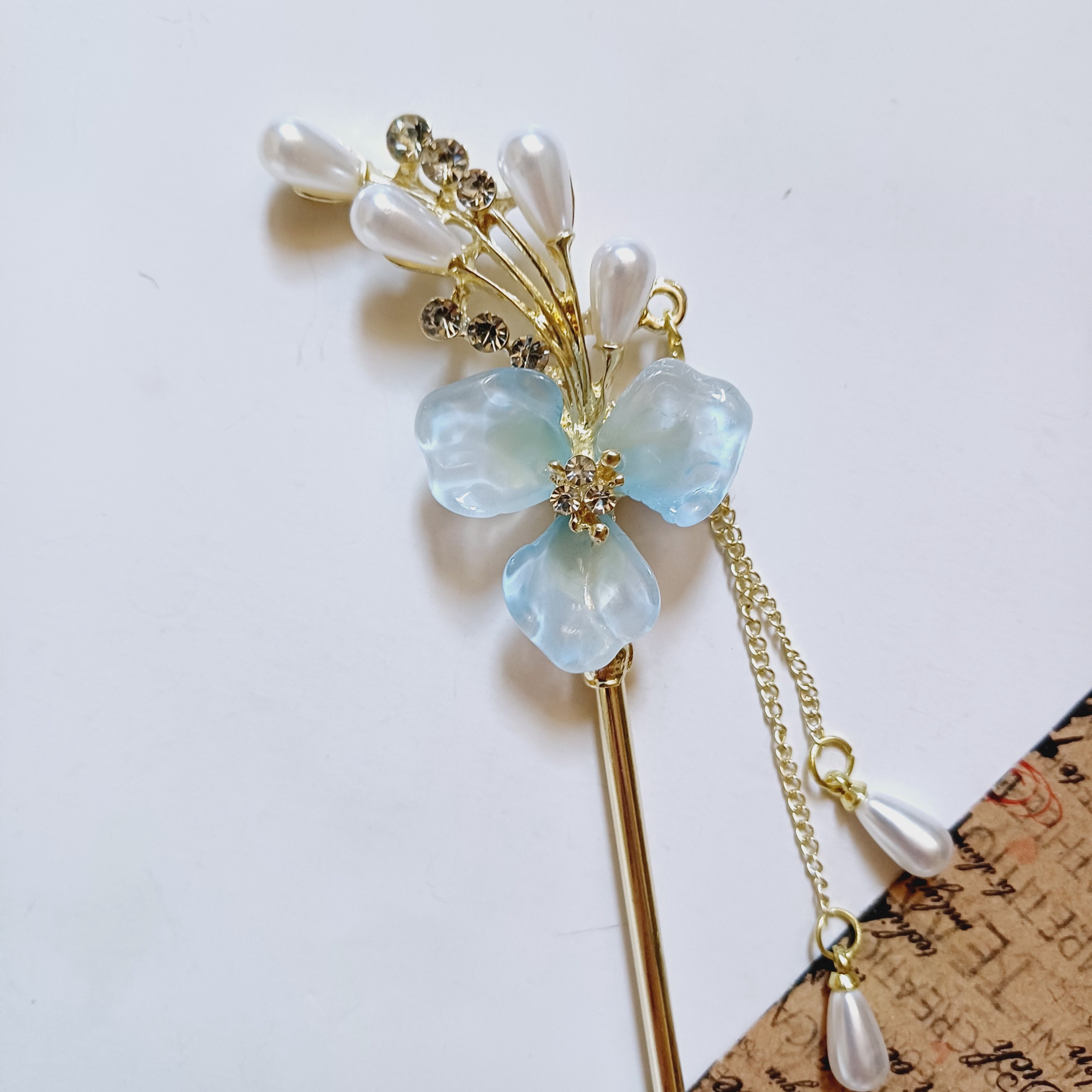 کانزاشی مو فلزی طرح گل سه پر آبی