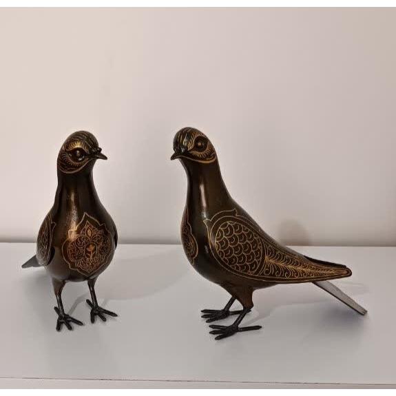 پرنده فولادی طلاکوب