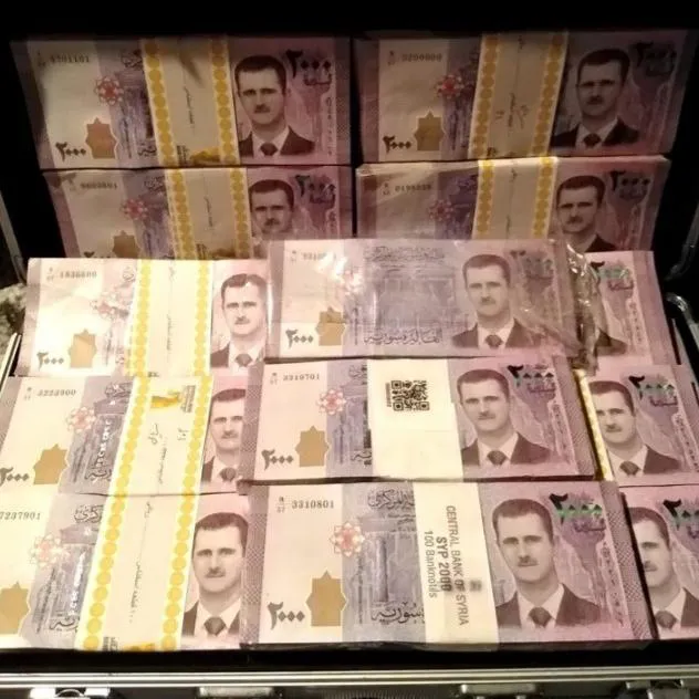 10 جفت 2000 لیره سوریه بشار اسد نو بانکی