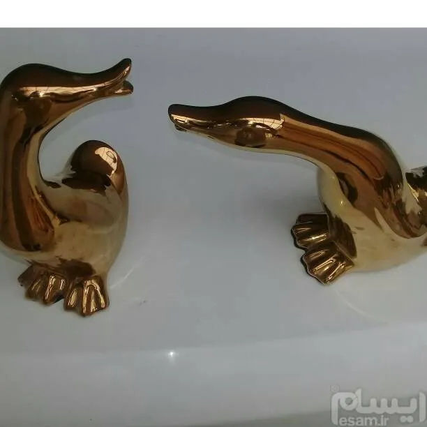 یک جفت قوی تزیینی تمام طلاکاری