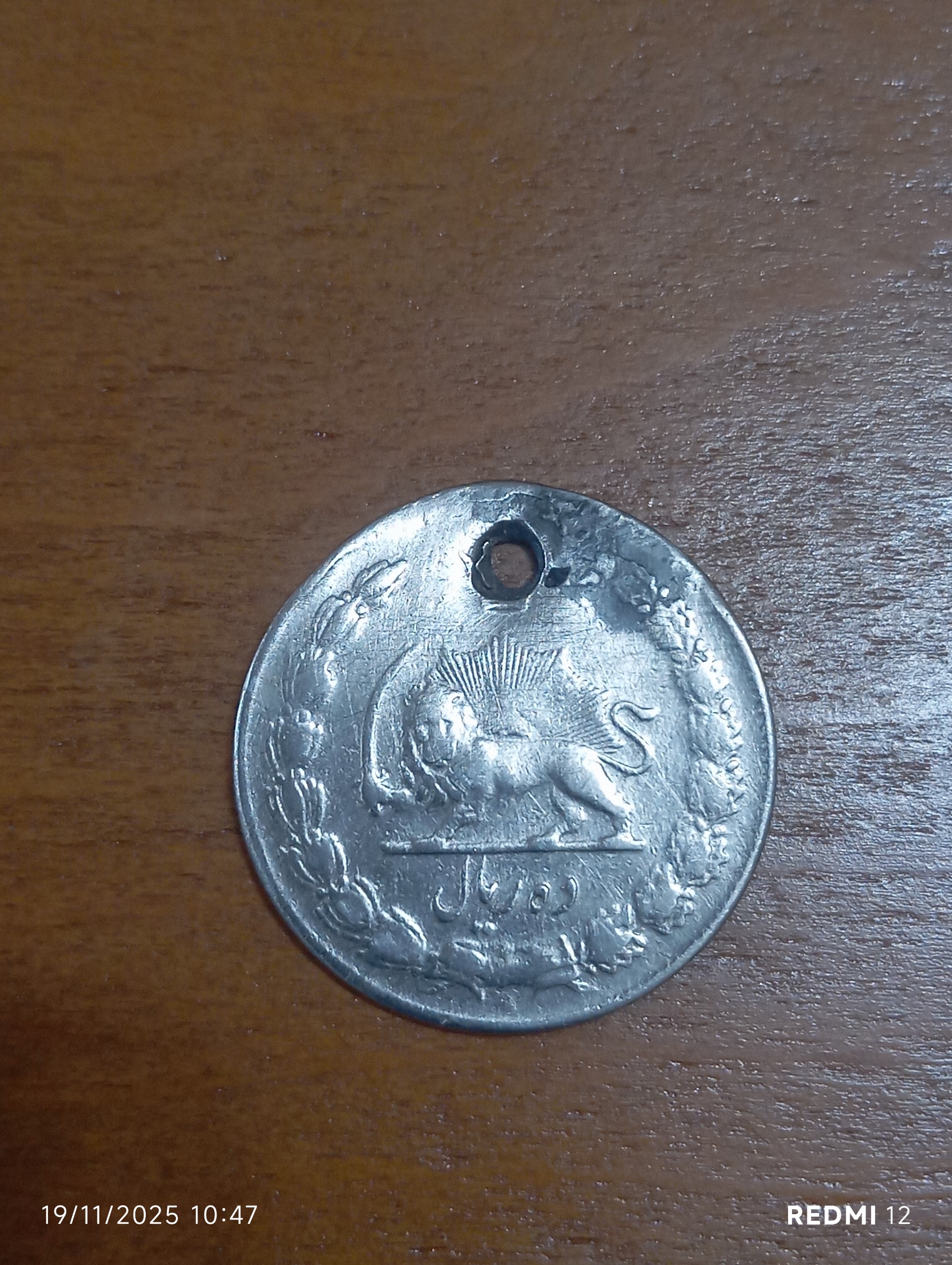 یک عدد سکه 10,ریالی شاهنشاهی نقره و خاص