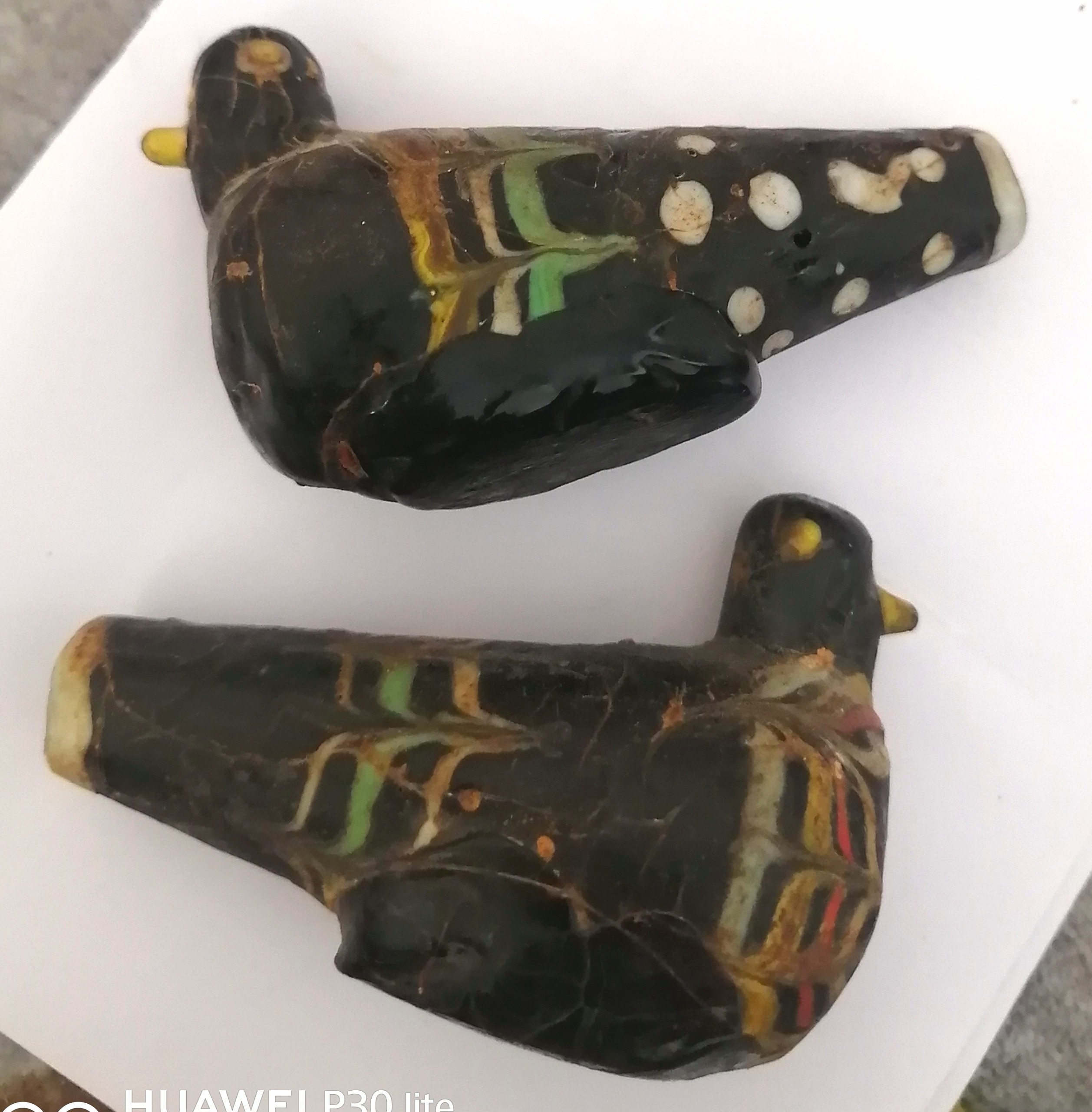 جفت مجسمه قدیمی پرنده