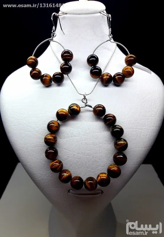 مزایده نیم ست نقره و چشم ببر معدنی دستساز