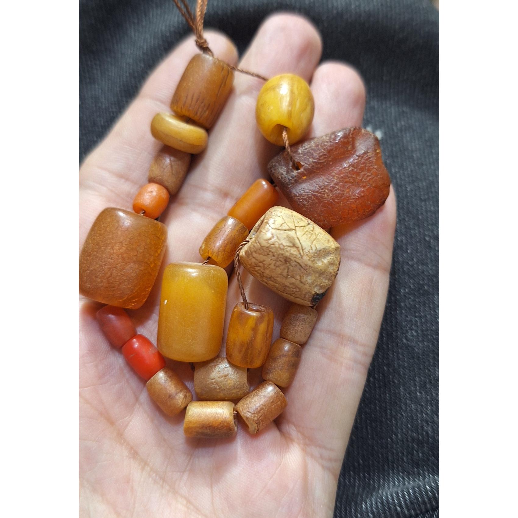 مهره های باغه و1عددکهربا مثقالی