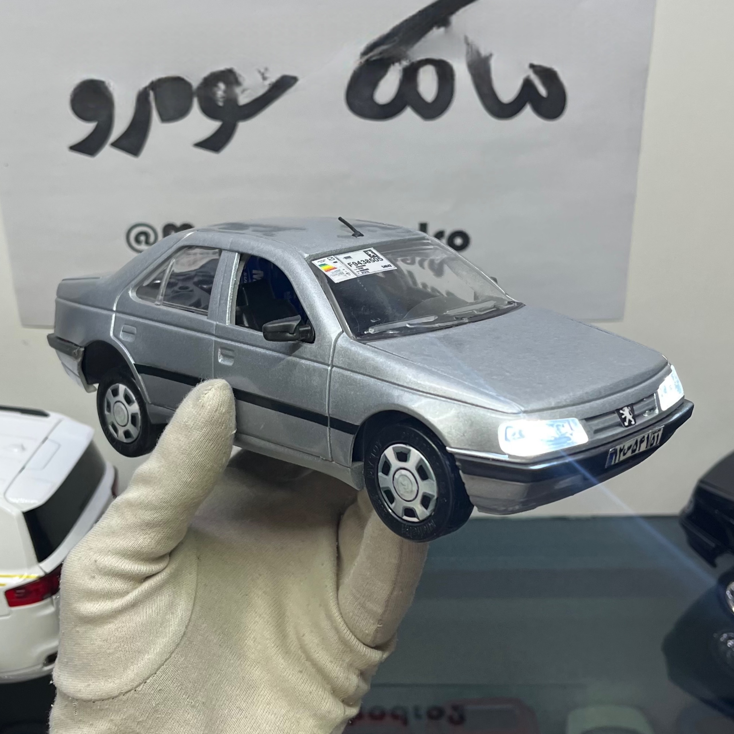 پژو 405 نقره ای قالپاق رانایی