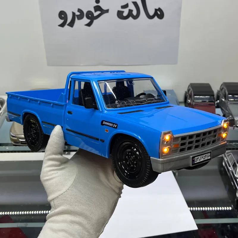 ماکت نیسان آبی چراغدار فنر دار