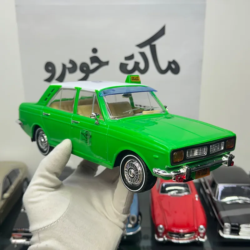 ماکت اسباب بازی پیکان تاکسی دولوکس سبز خیاری