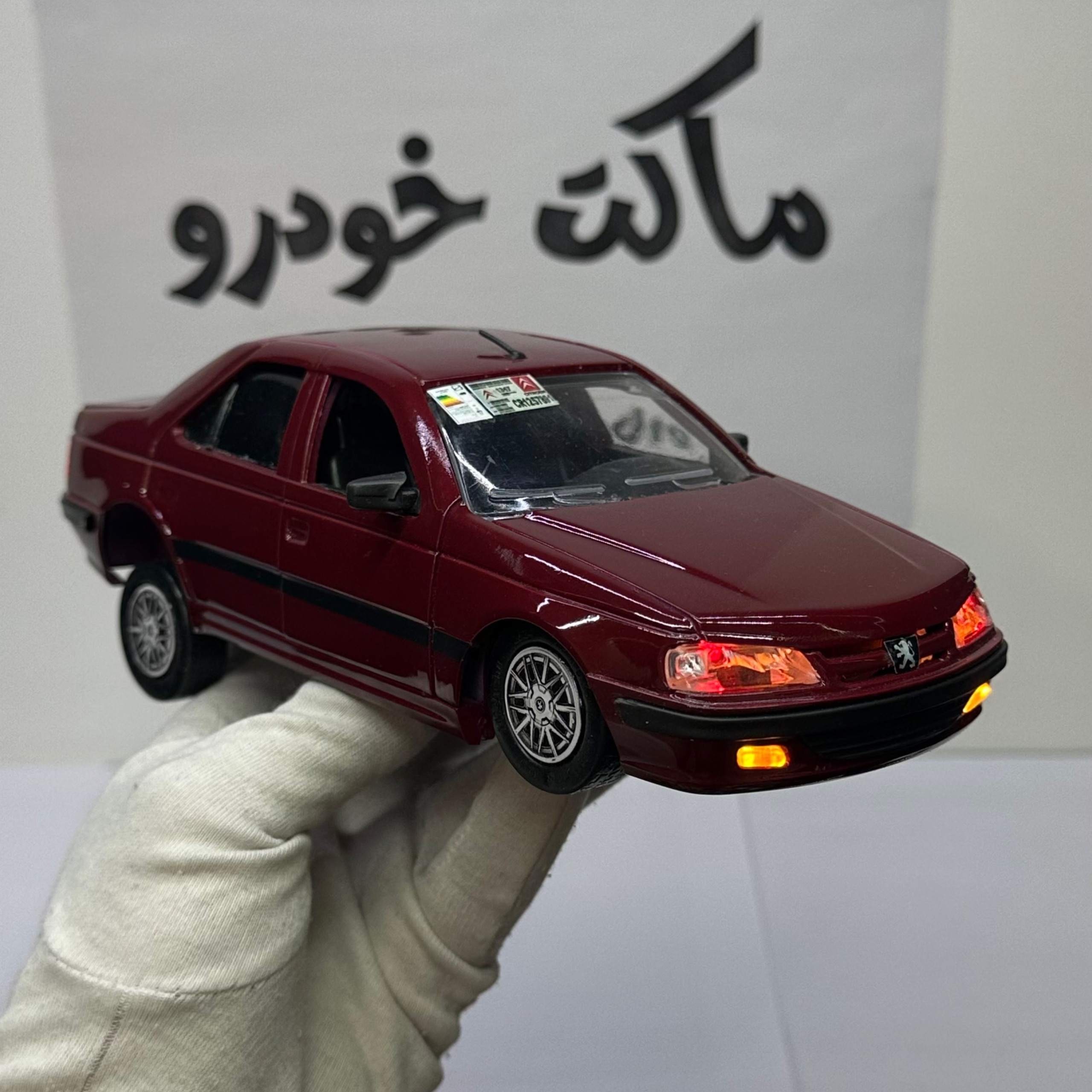 ماکت پژو پرشیا عنابی شوتی چراغدار