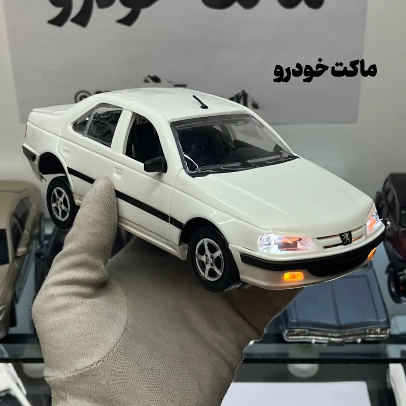 پژو پارس سفید رینگ پنج پر چراغدار