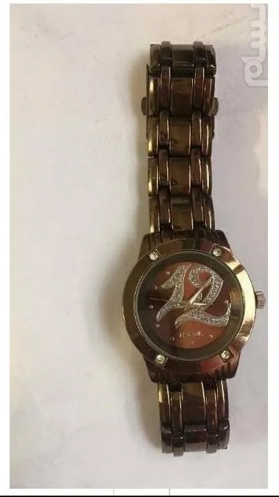 ساعت مچی زیبا اصیل کیفیت ساخت بالا طبق توضیح