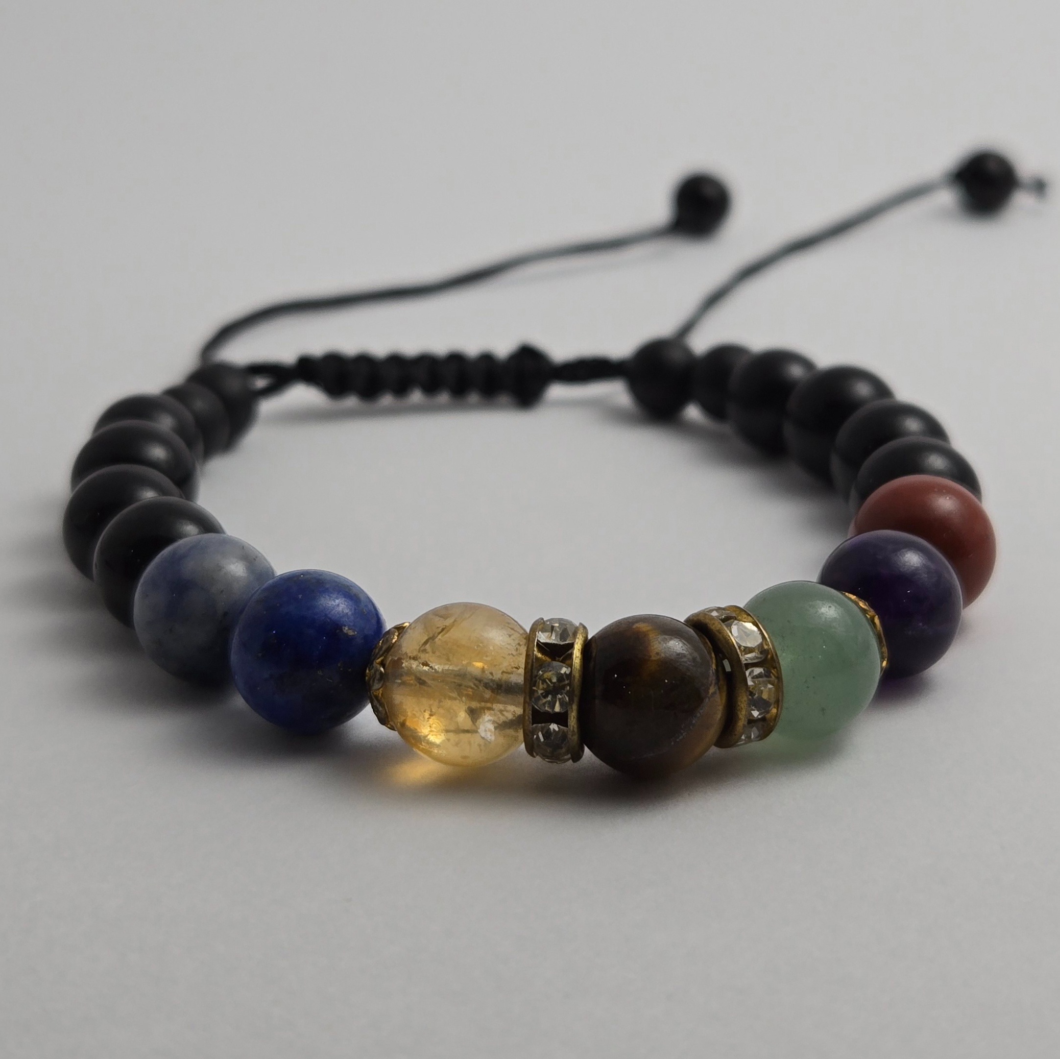 دستبند سنگی انرژی مهره های هفت سنگ معدنی