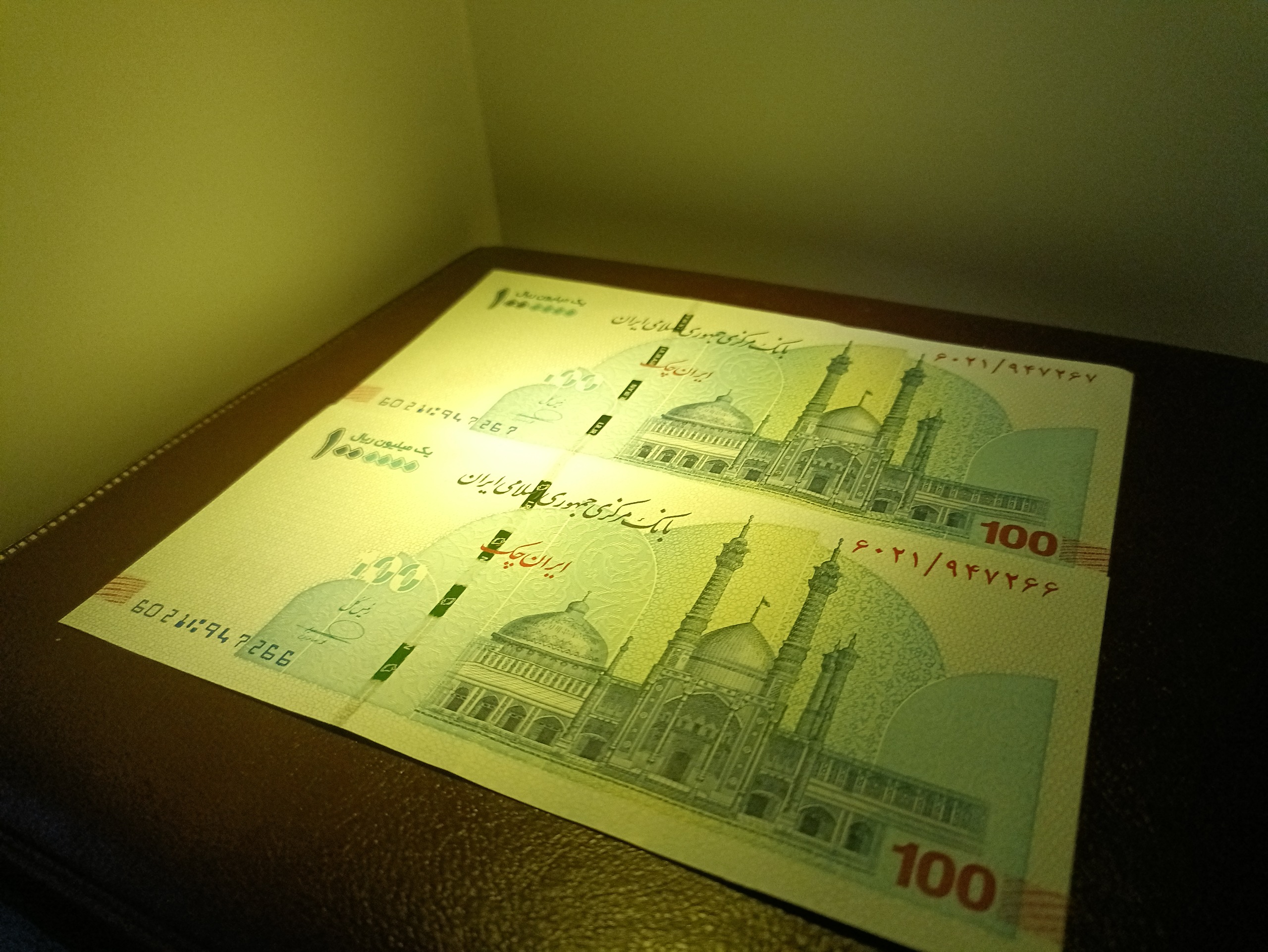 جفت اسکناس 100 هزار تومانی