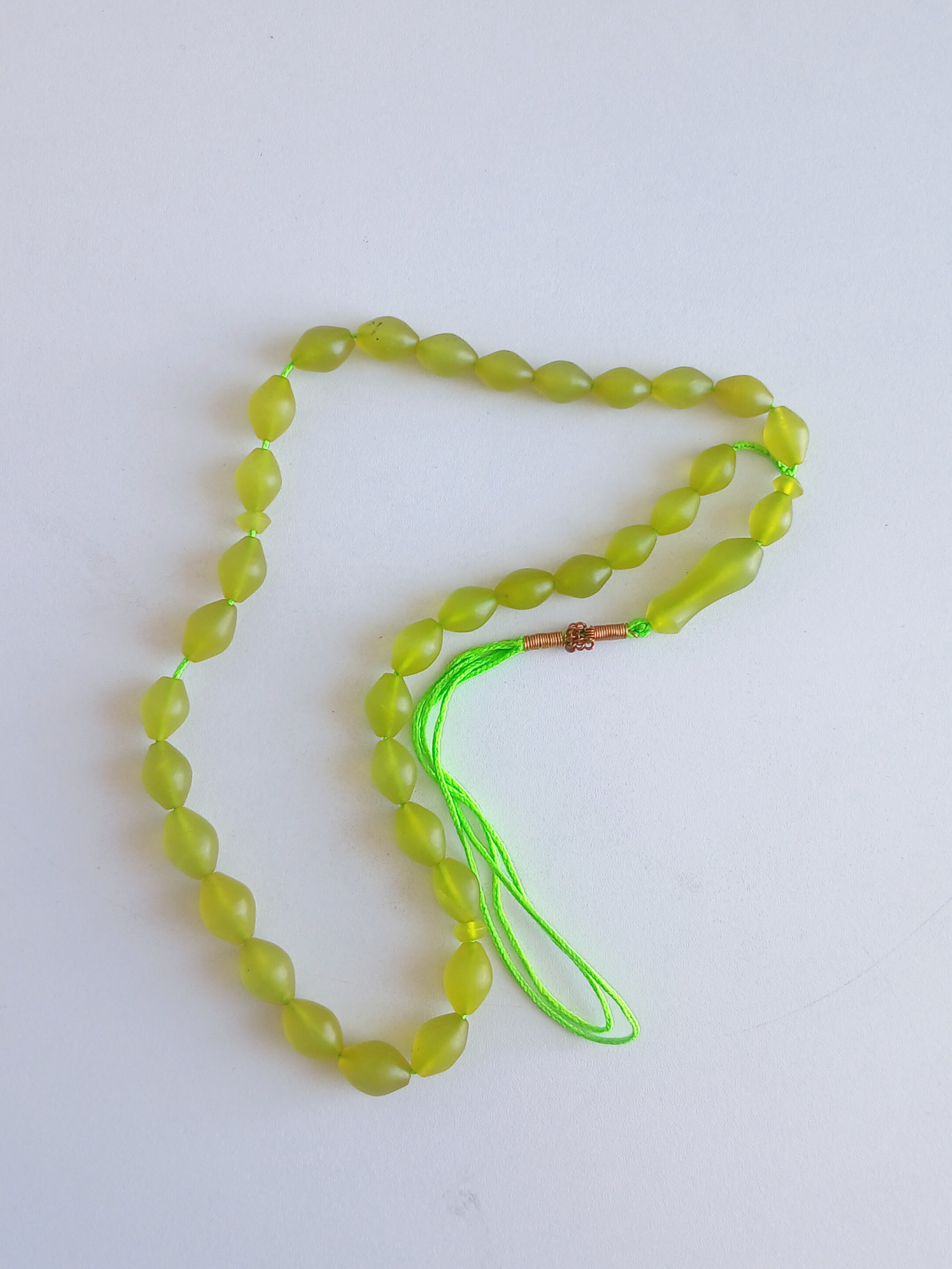 تسبیح شاه مقصود زرد قناری 33 دانه