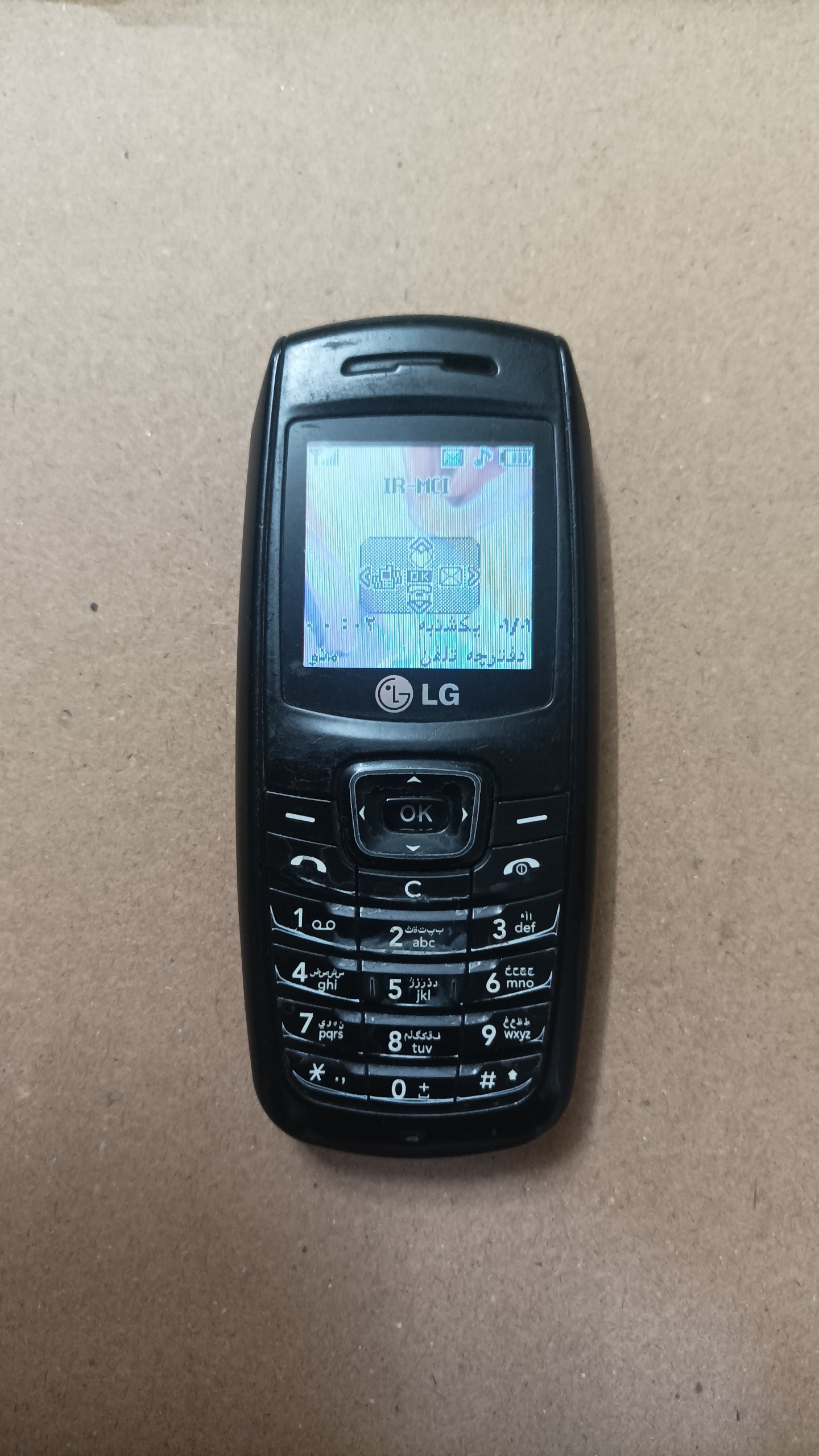 LG kg110 با شارژر و باتری