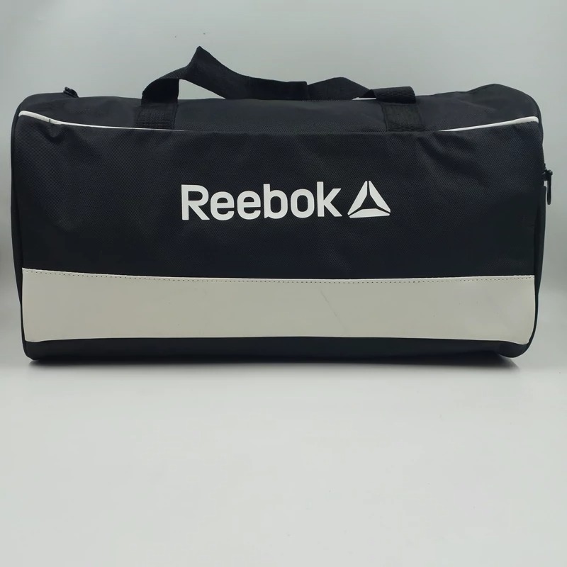 ساک ورزشی مسافرتی برزنتی چرمی ریباک REEBOK مشکی