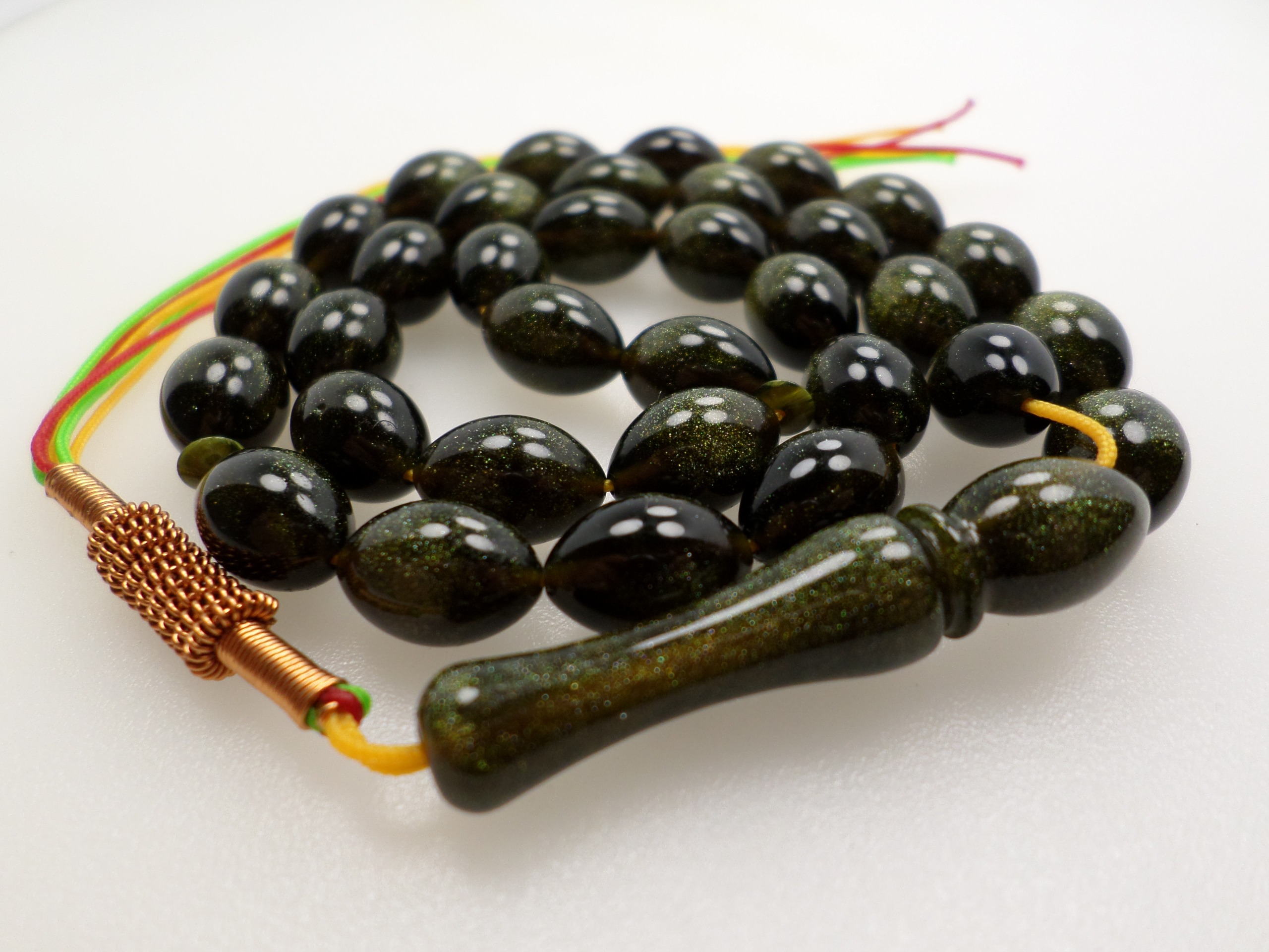 تسبیح 33عددی کهربا پودری زر افشان مالاکیتی  کد 314