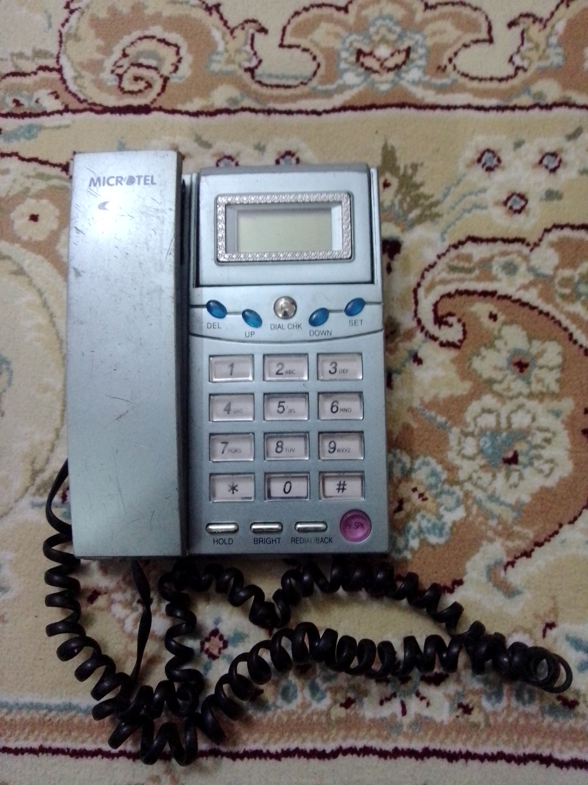 تلفن میکرو تل معیوب فقط زنگ می خورد