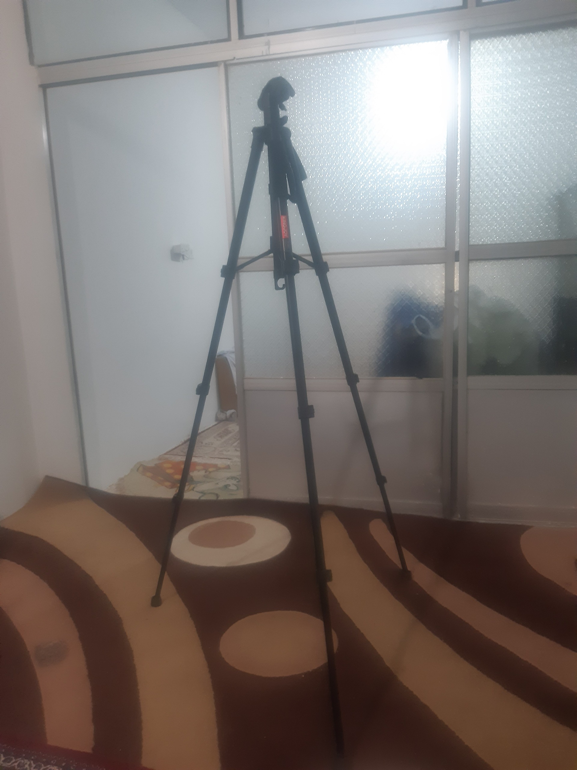 سه پایه دوربین عکاسی