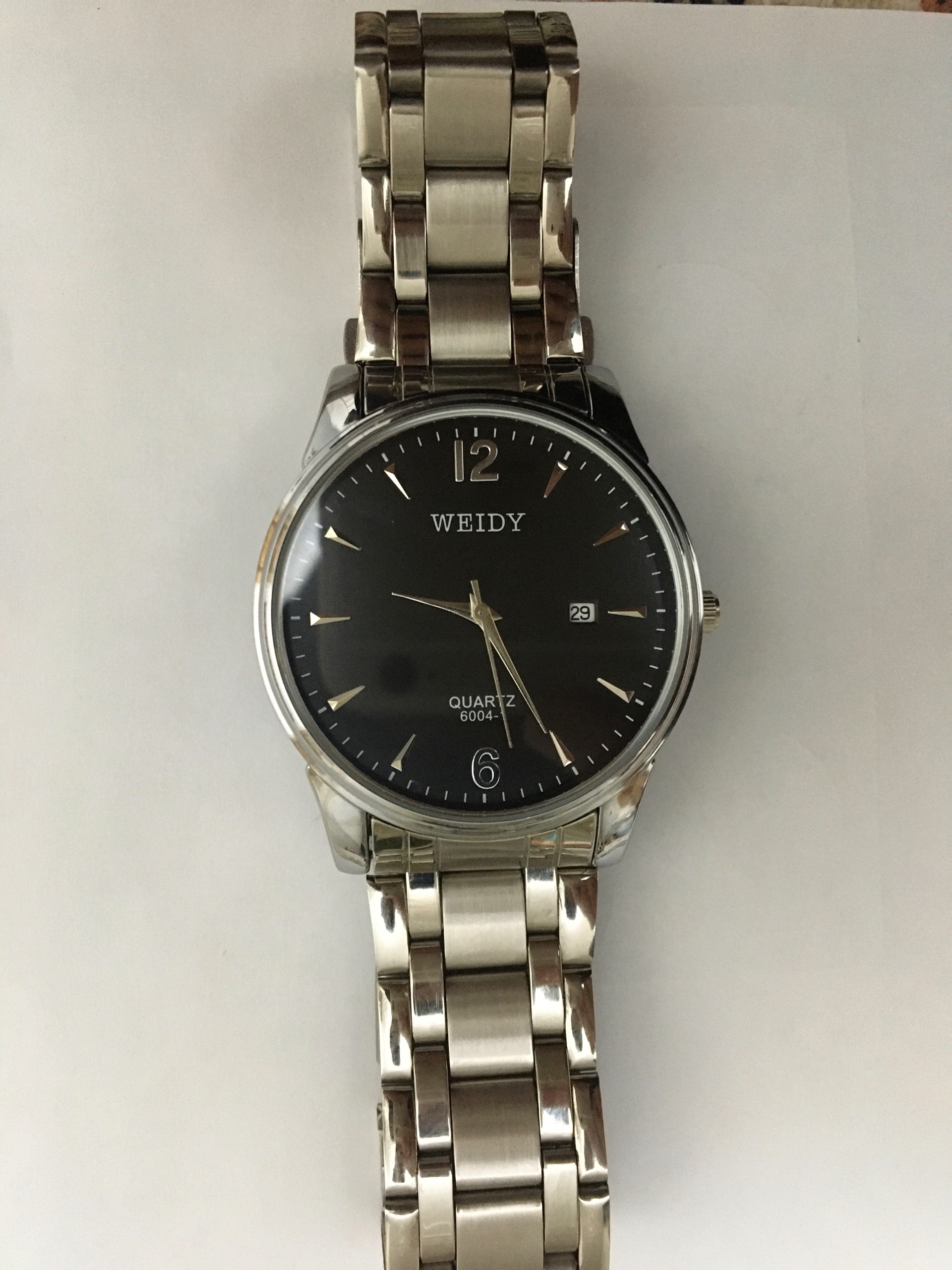 ساعت مچی عقربه ای