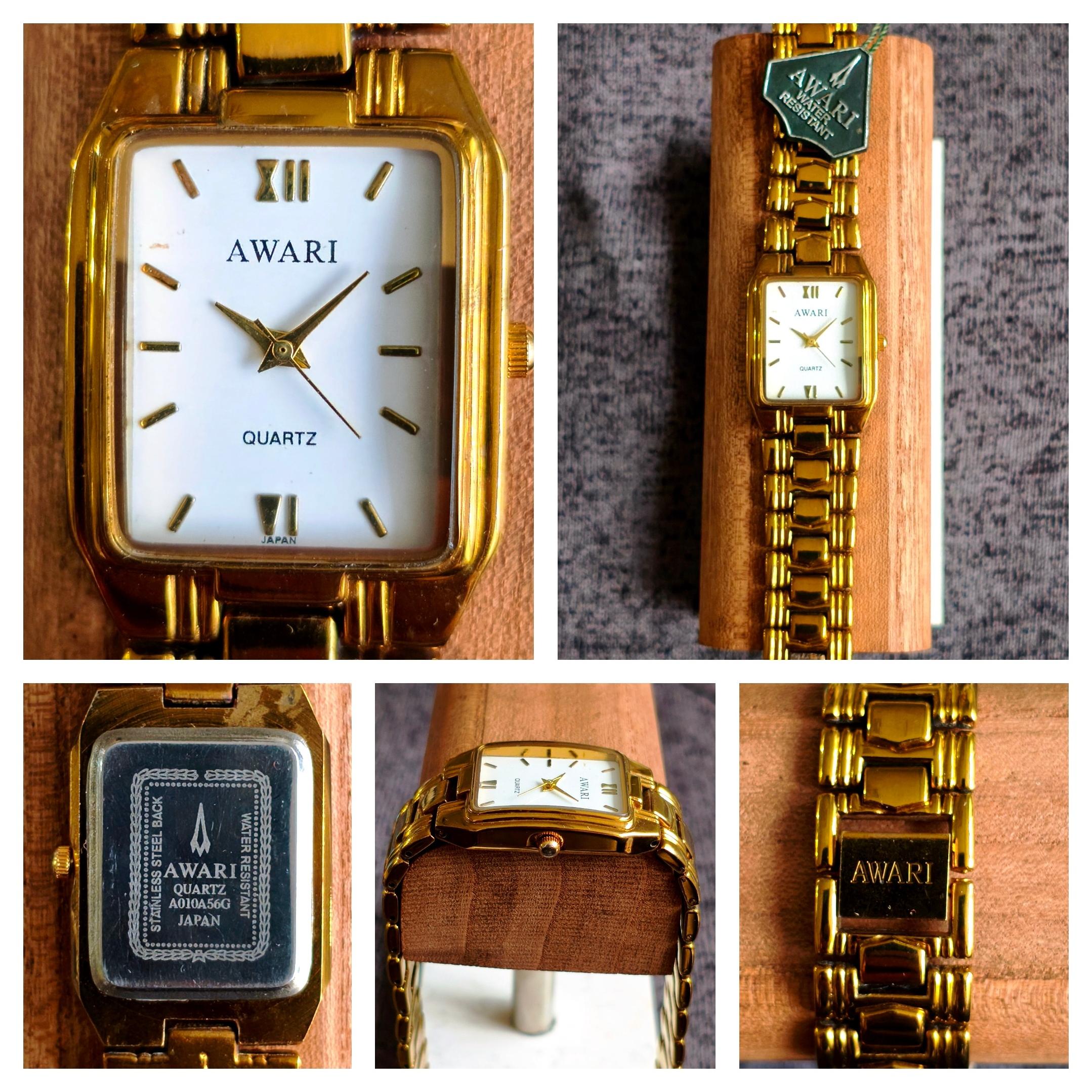 ساعت اصل AWARI طلایی یونیسکس نو