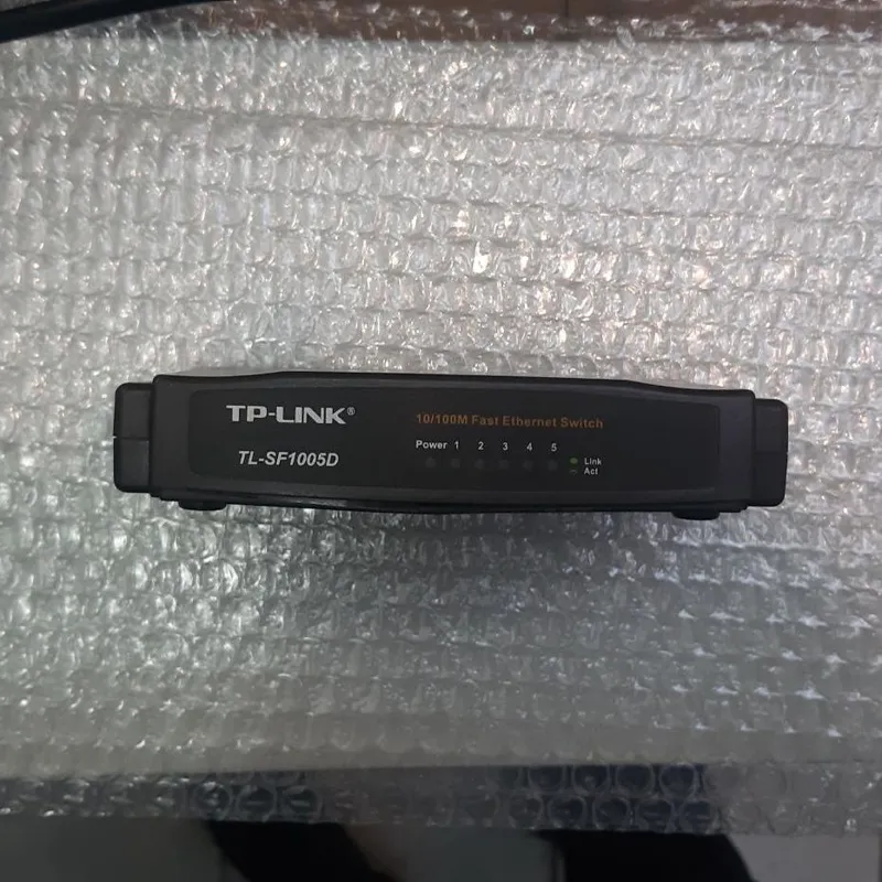 سوپیچ شبکه 10/100TP-LINK tl-sf1005d و آداپتور 12V
