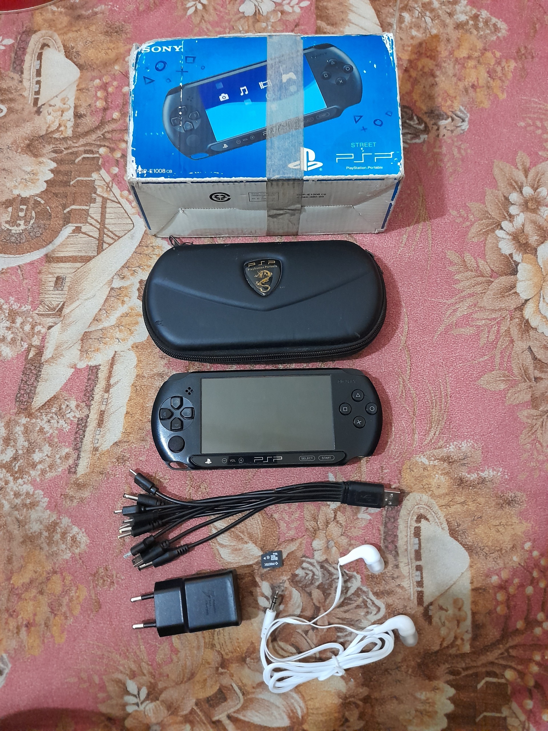 کنسول بازیpspE1008اورجینال کپی خور