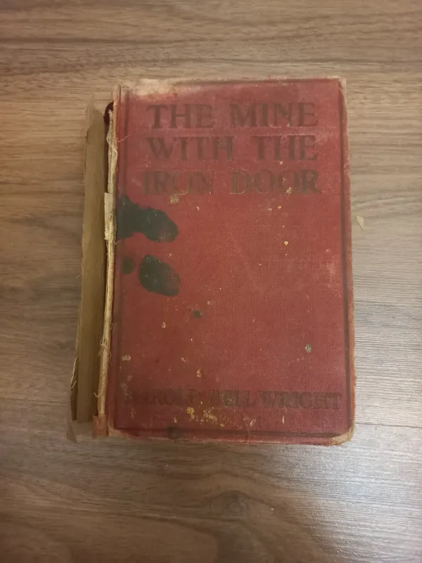 THE MINE WITH THE IRON DOOR