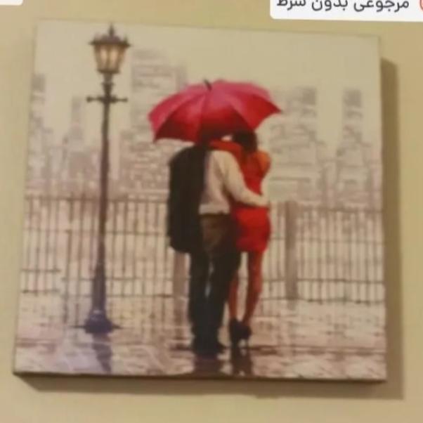 تابلوی چوبی عاشقان در باران