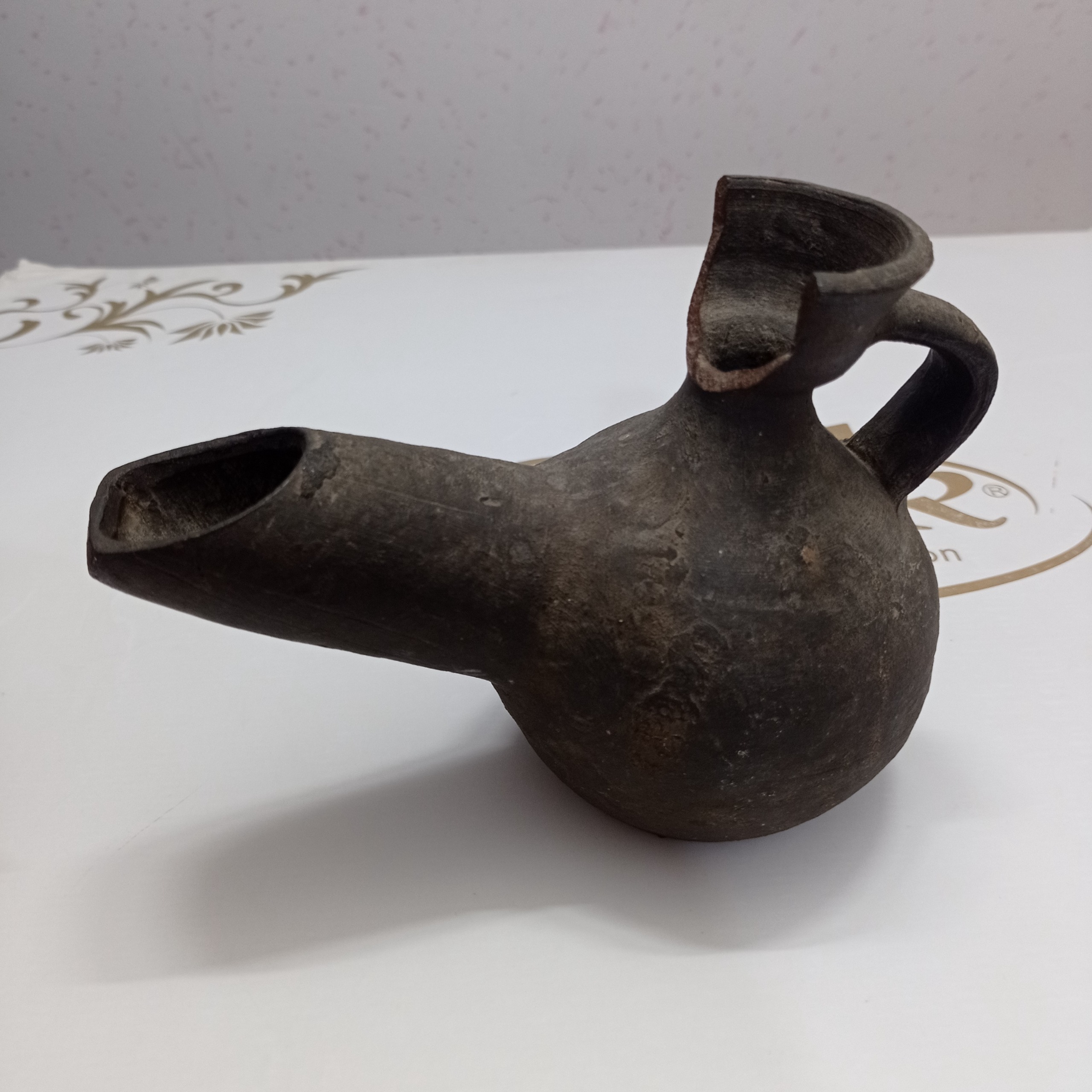 پیسوز سفالی خاکستری