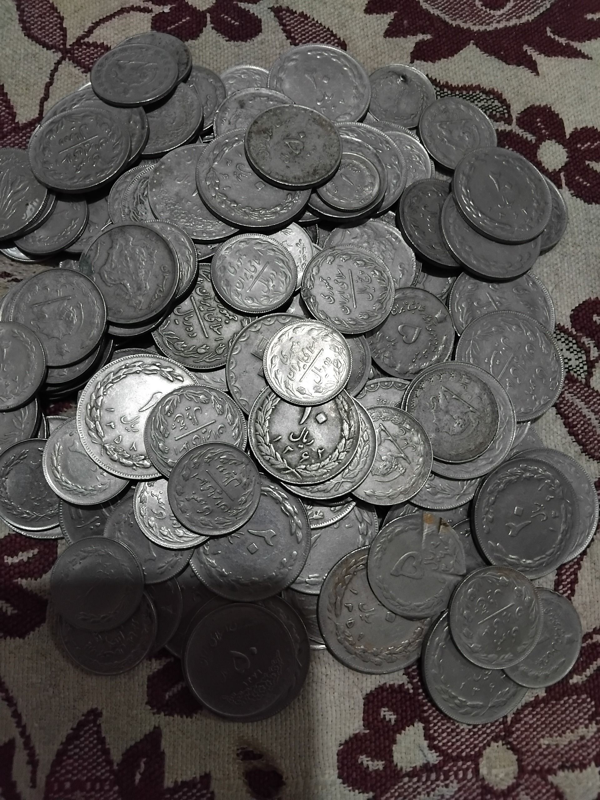 تعداد 150 سکه نیکل اصل و تمام