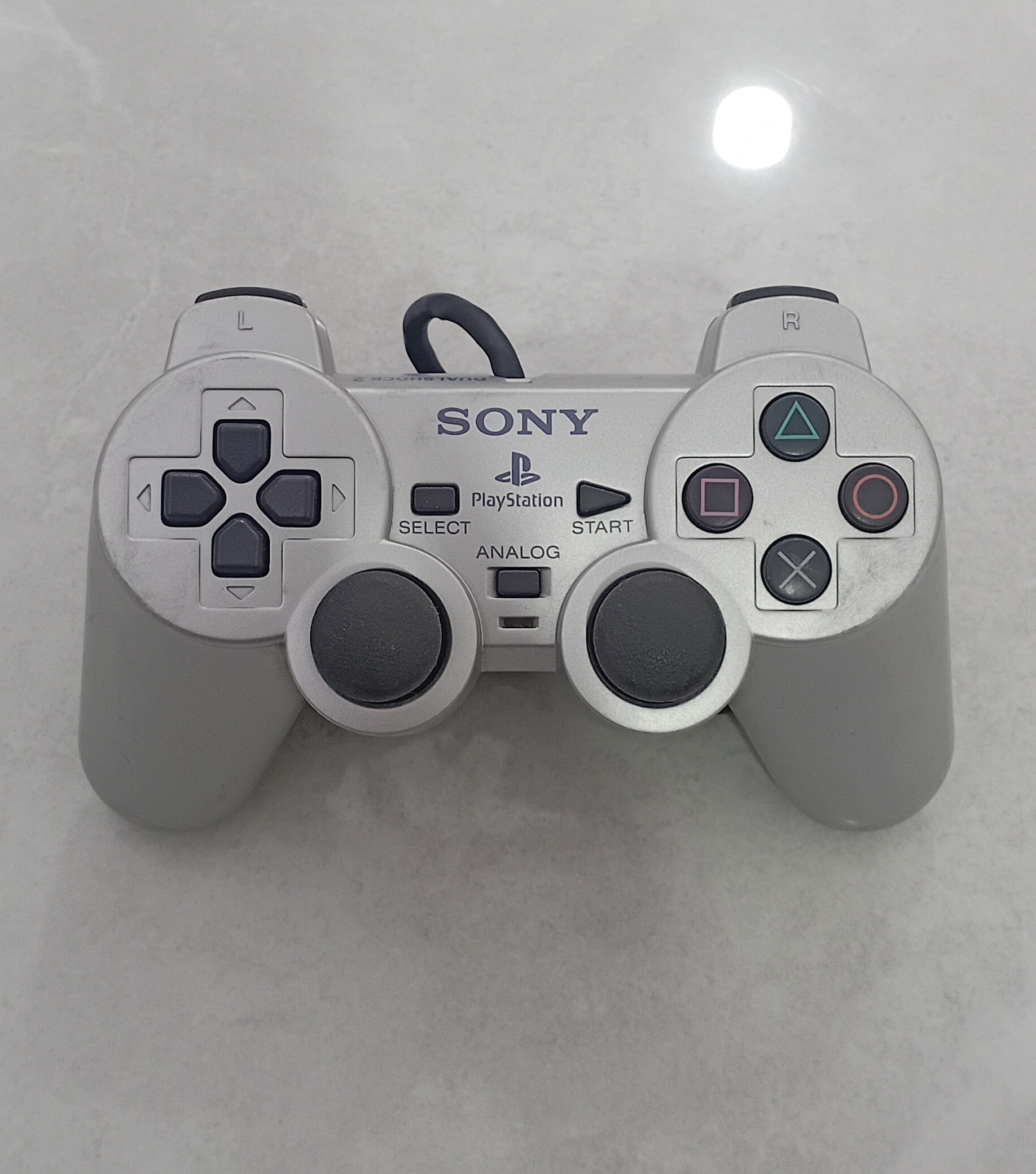 دسته اورجینال PS2 نقره ای سری H سیم ابریشمی