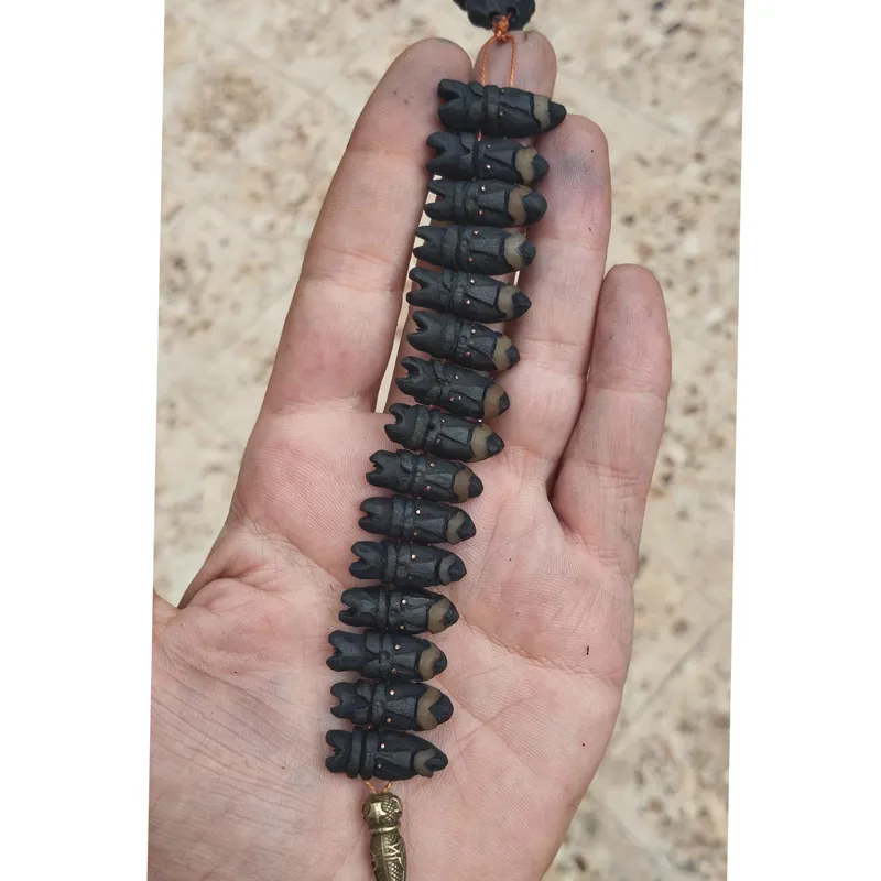 تسبیح هسته خرما توضیحات دارد