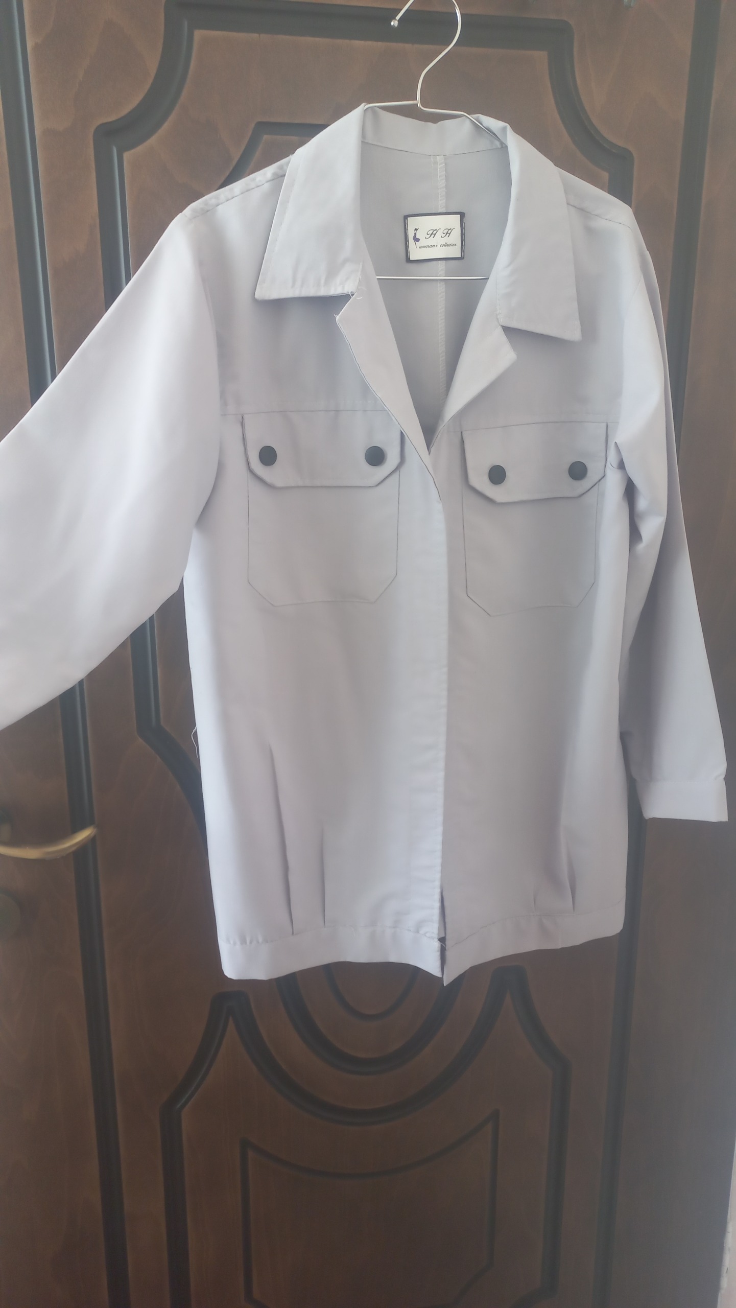 مانتو طوسی روشن طرح جیب سایز L