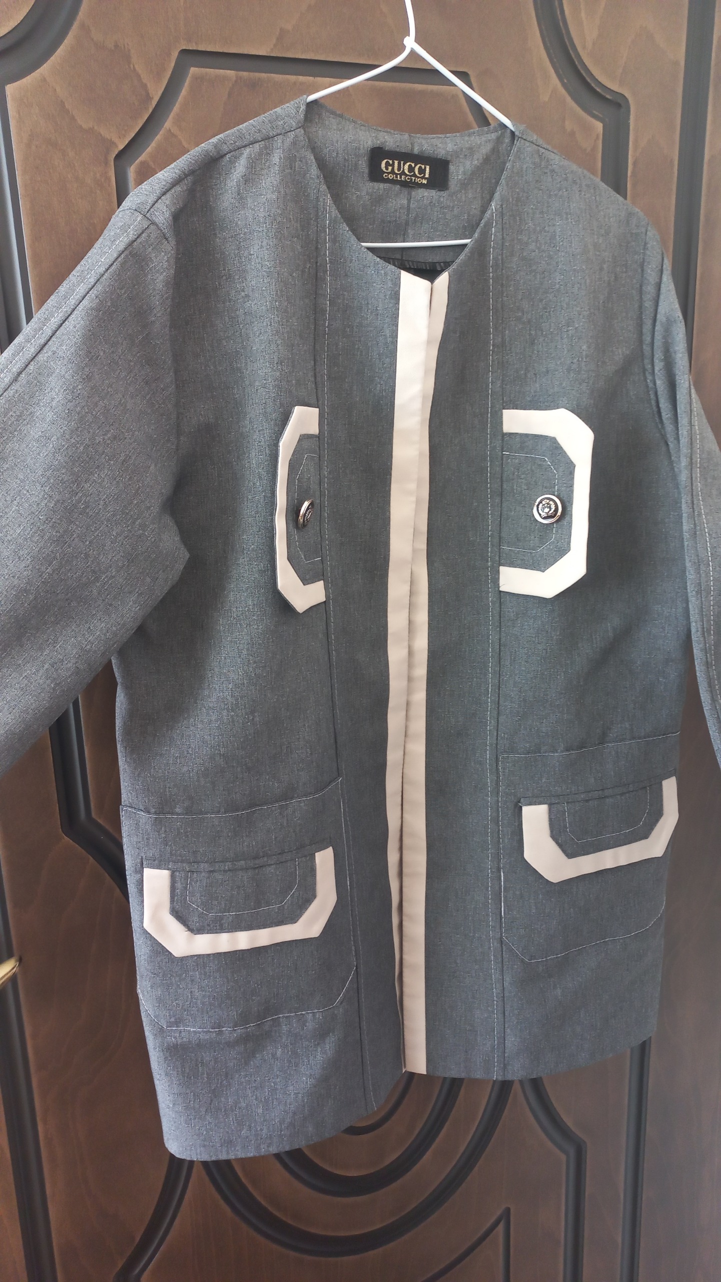 مانتو طوسی رنگ اسپرت طرح جیب قد 80سایز L