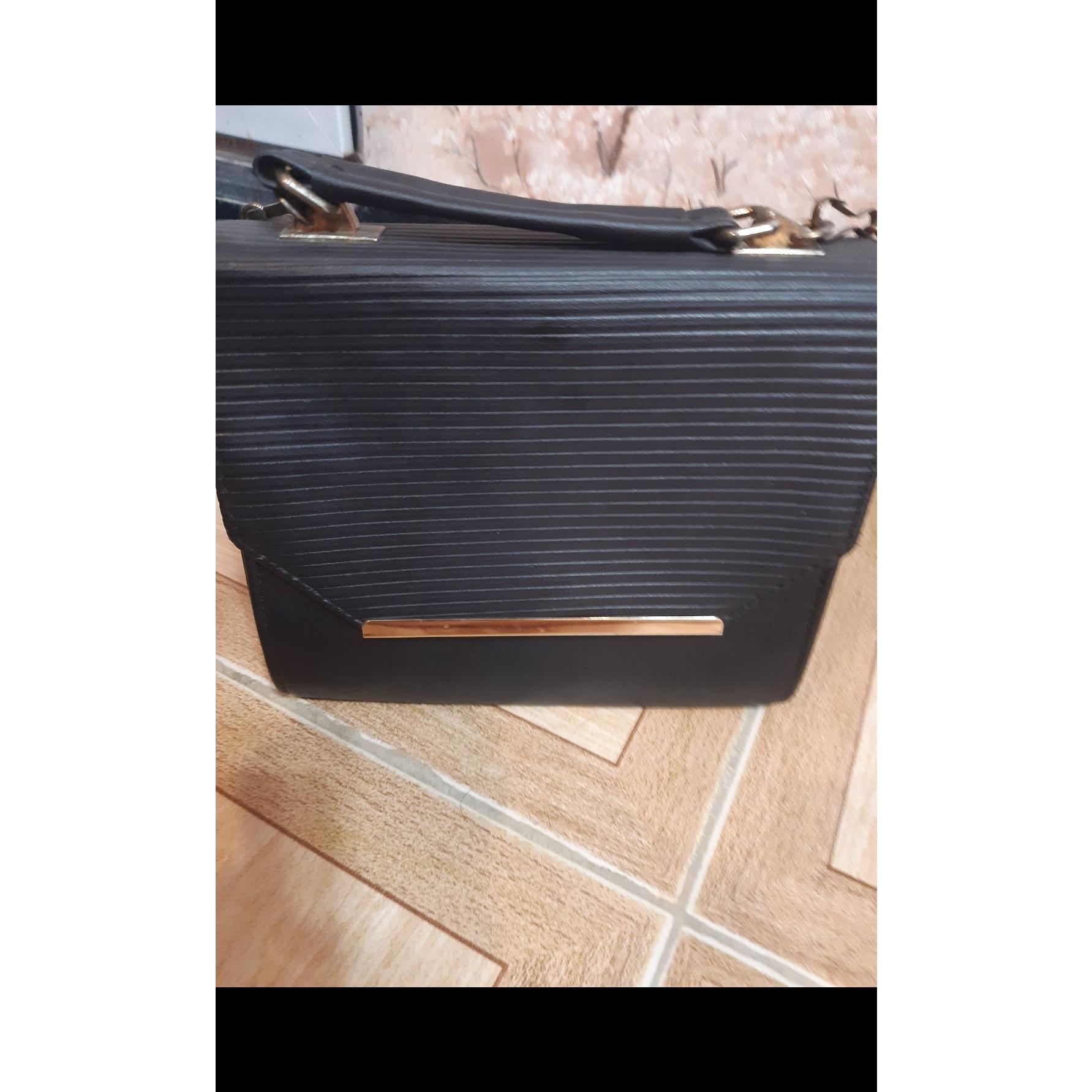 کیف برزنتی مجلسی ساده و شیک( رنگ مشکی)