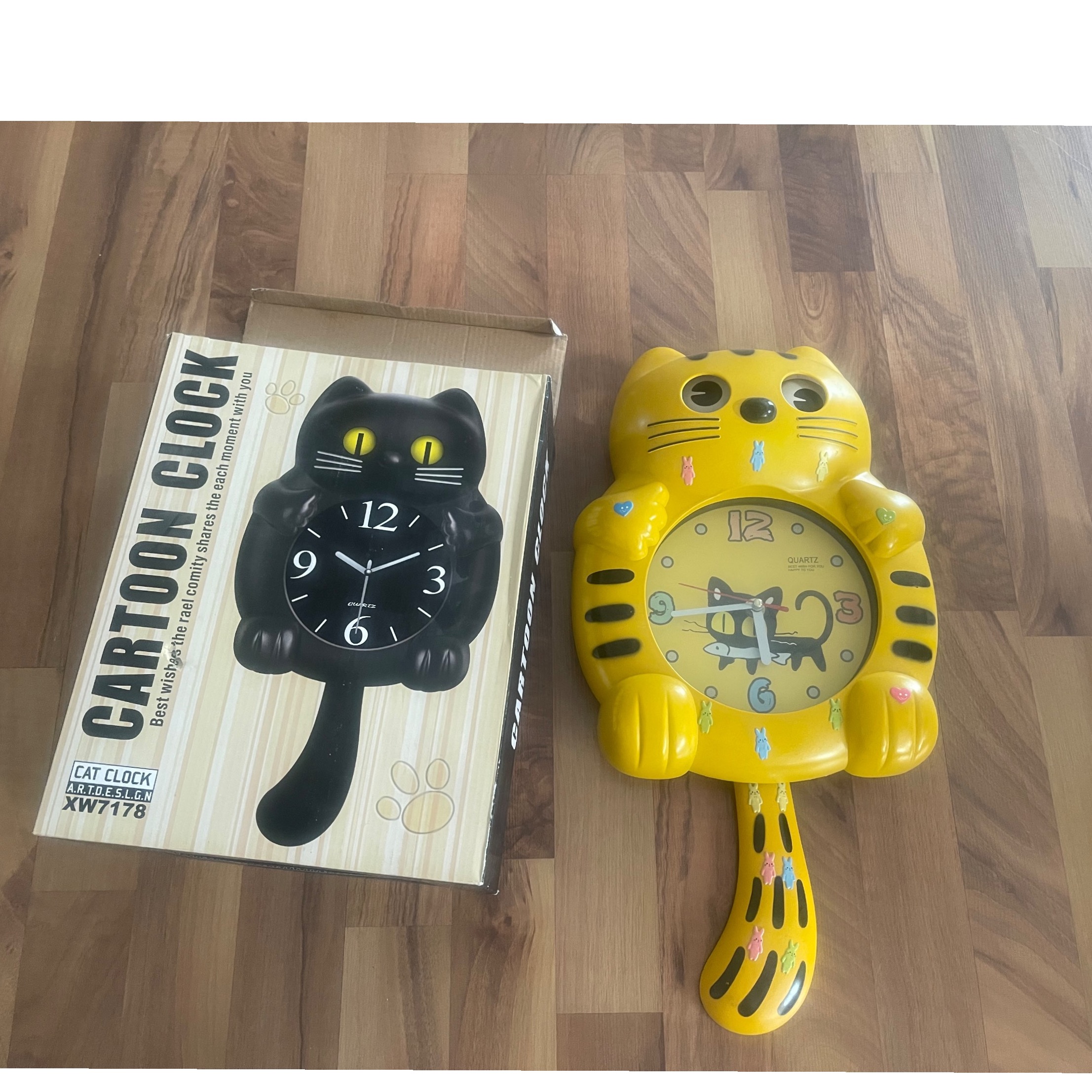 ساعت دیواری کودکانه گربه زرد