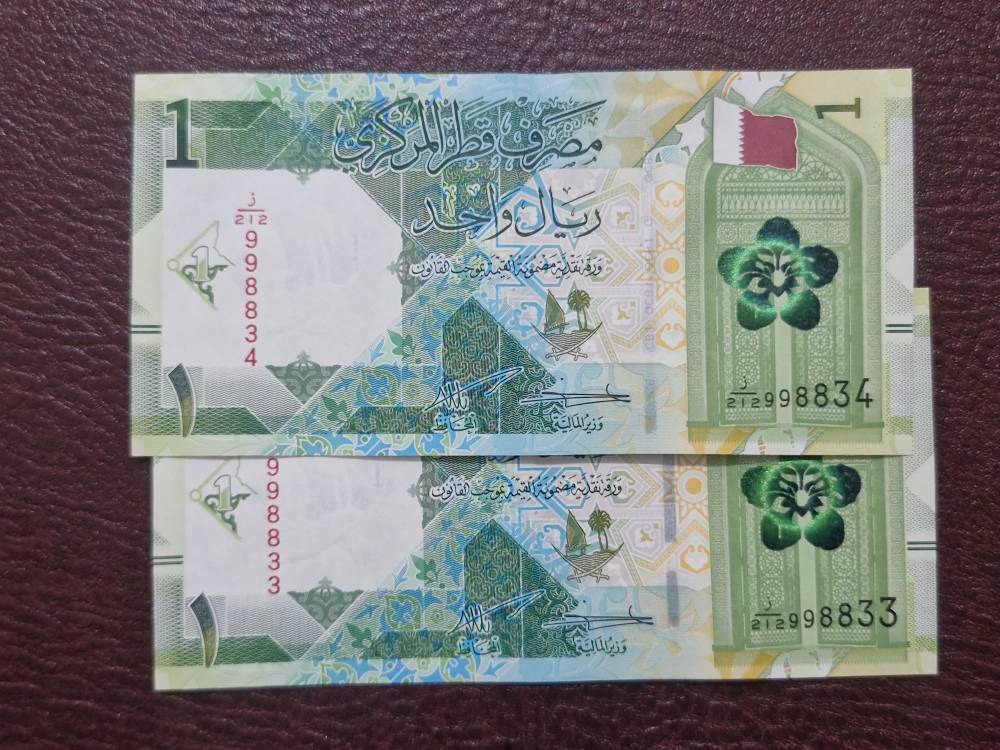 جفت اسکناس یک ریال قطر