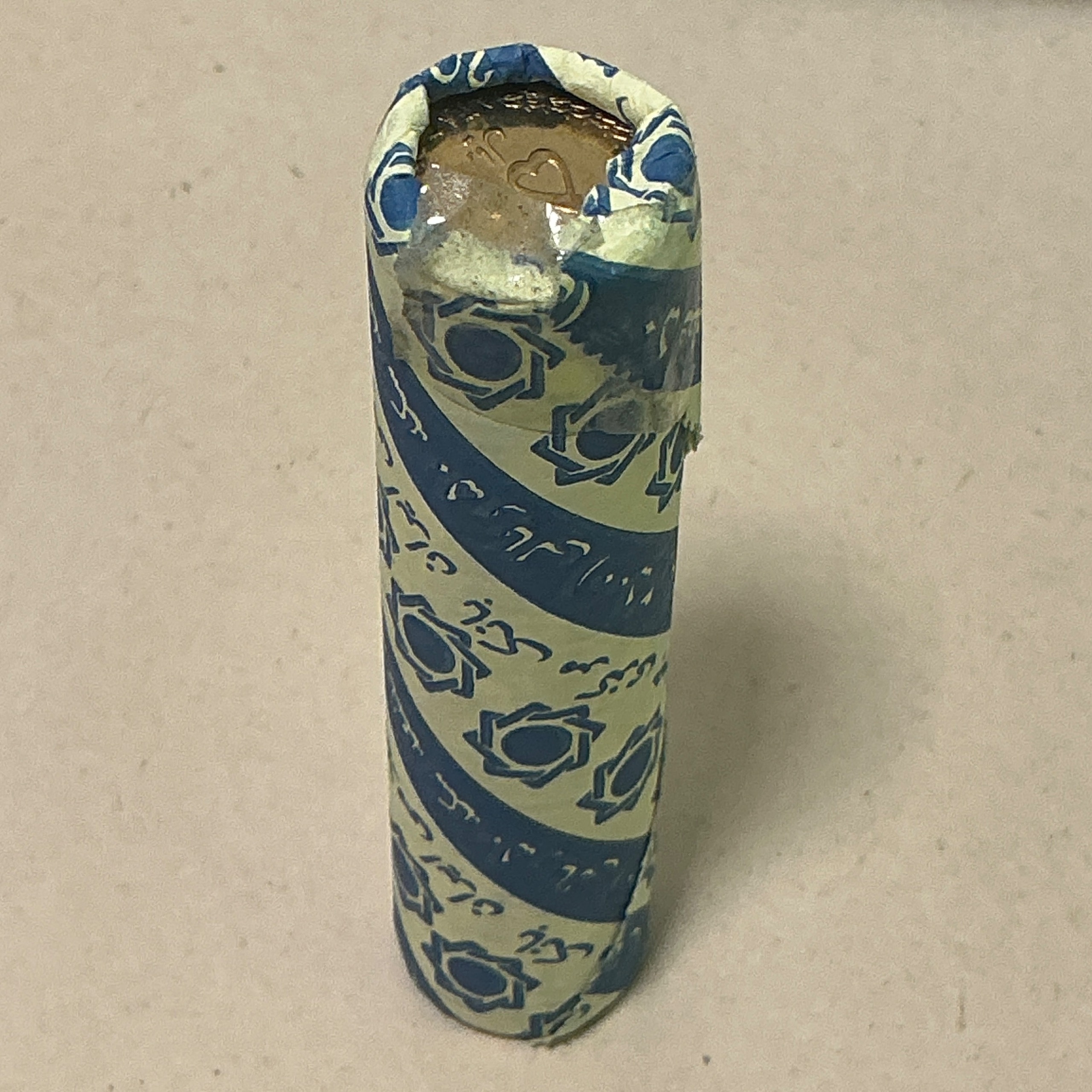 رول سکه 50 ریال معصومه چسبی