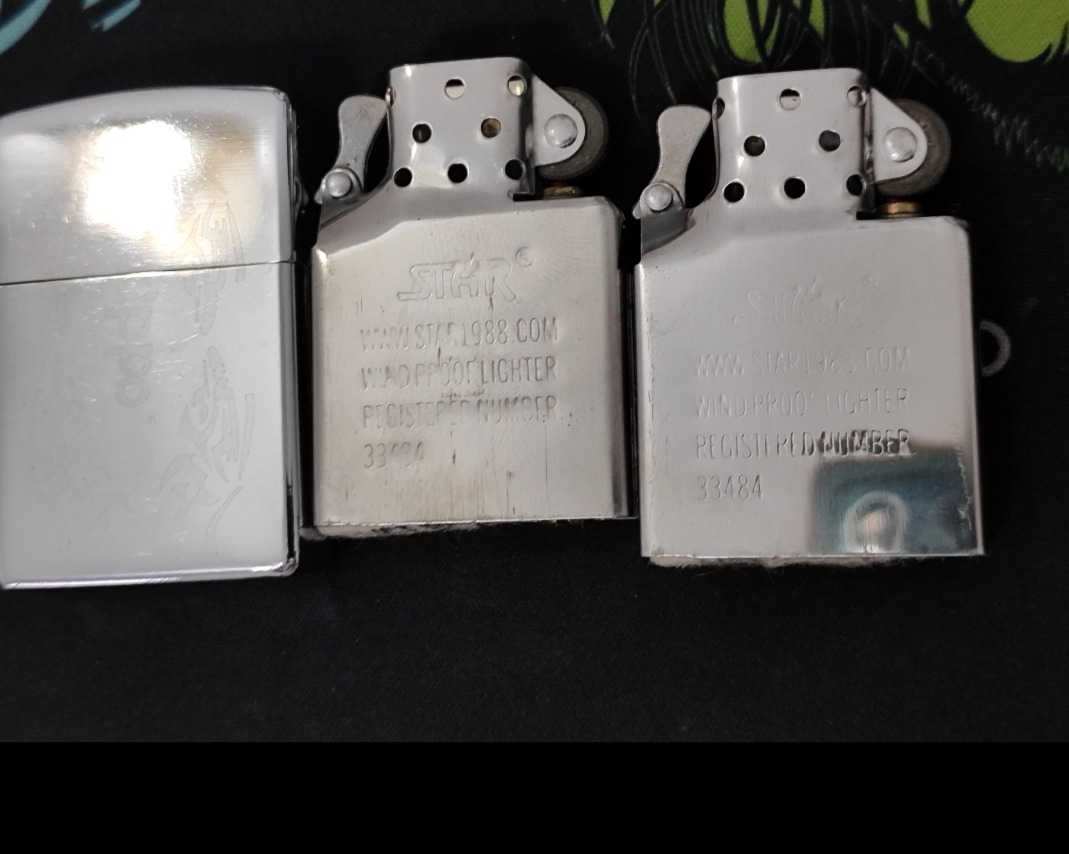 یک عدد زیپو بنزینی با دوعدد مغزی داخل،نو