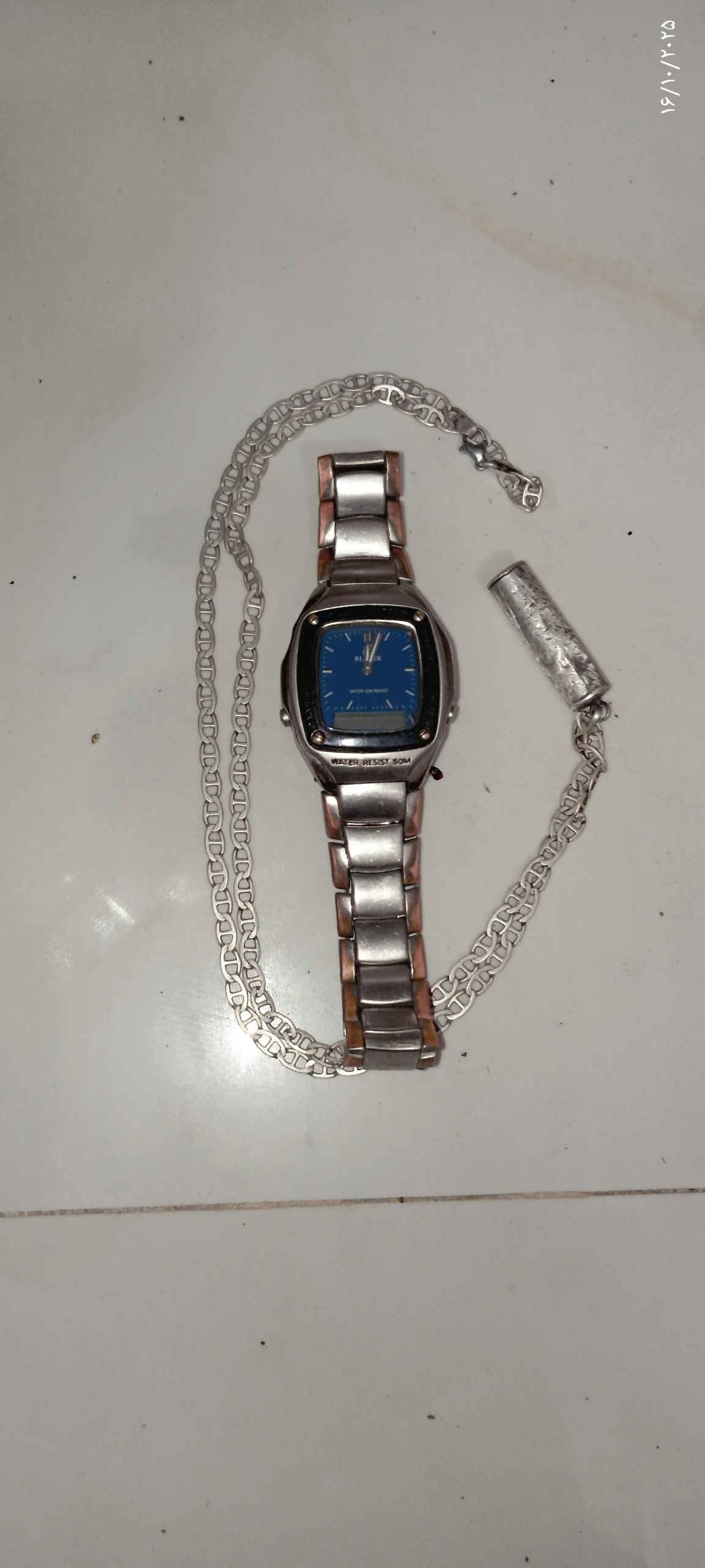 ساعت قدیمی و حرز امام جواد