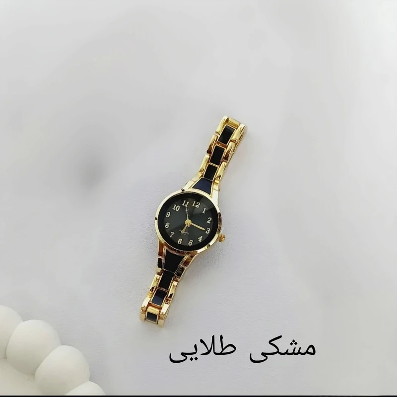 ساعت مچی عقربه ای زنانه بند فلزی طرح سرامیکی
