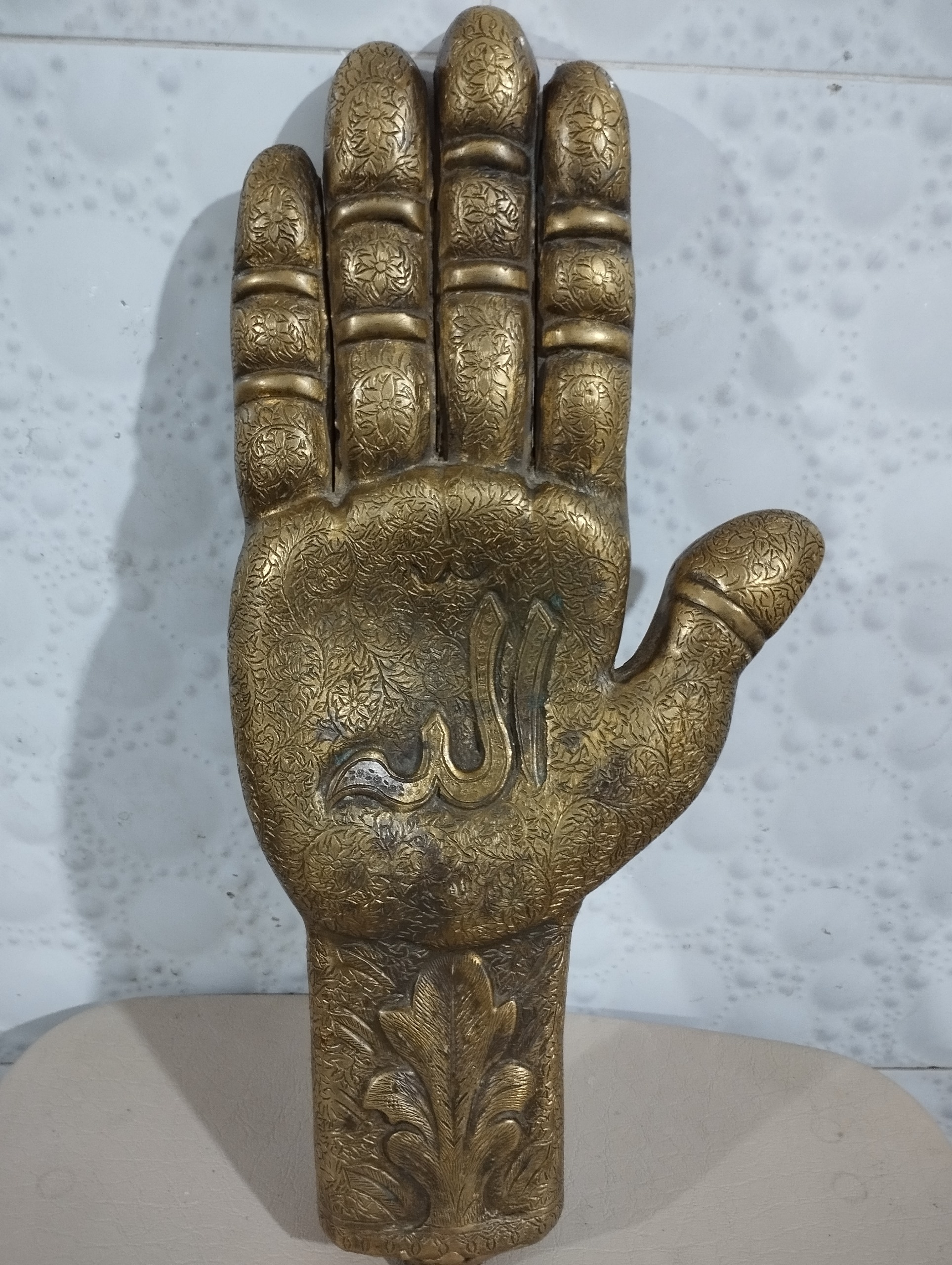 دست پنج تن برنجی