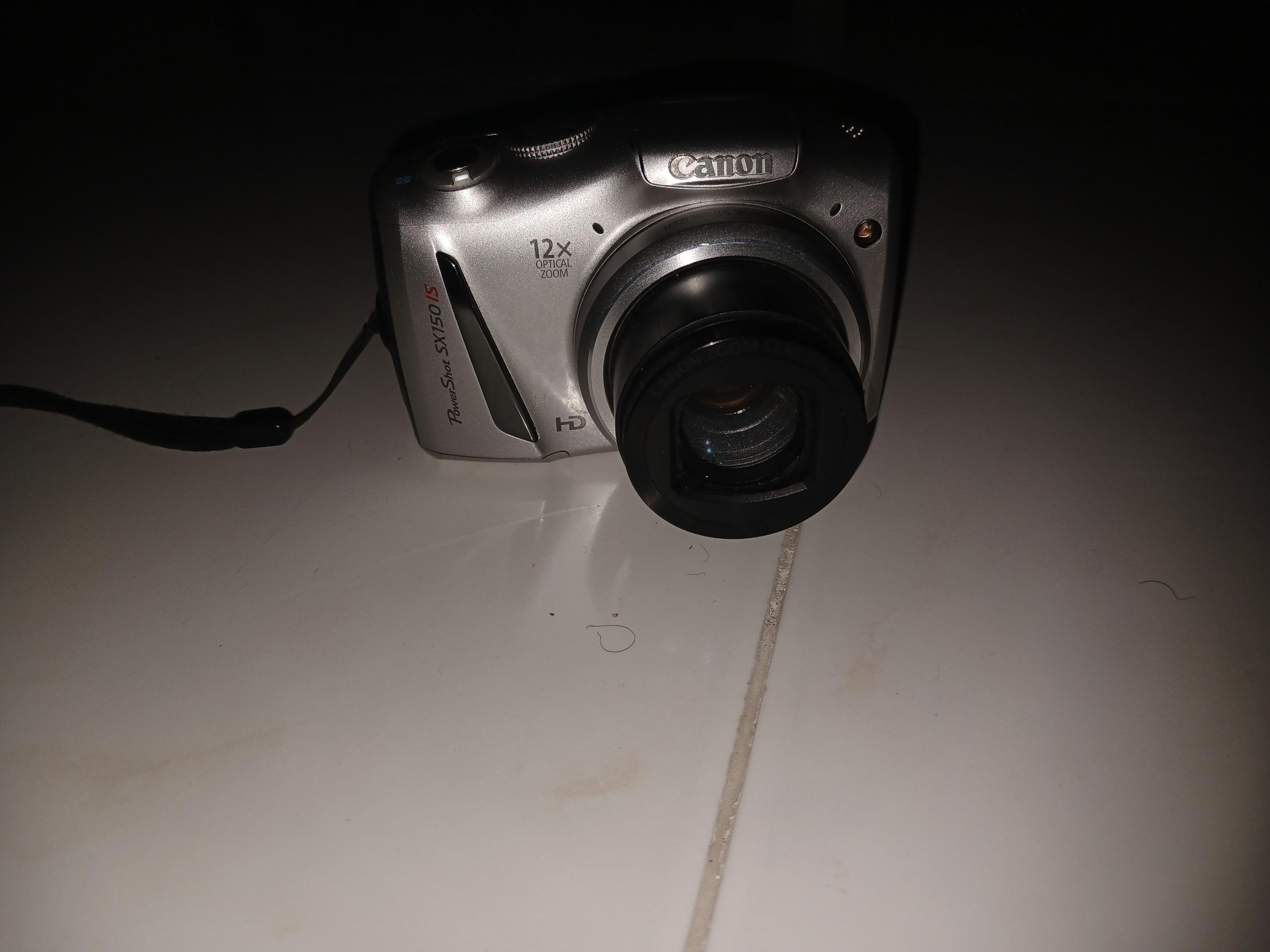 دوربین canon sx150 is(توضیحات دارد)