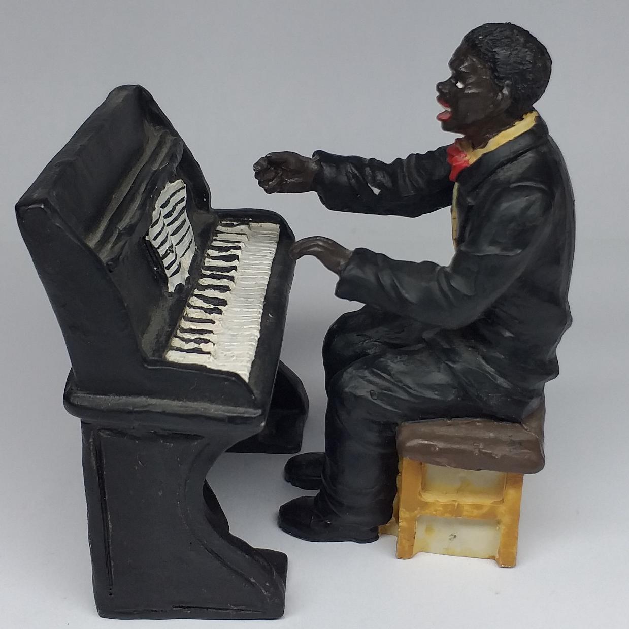 مجسمه قدیمی دو تکه مرد پیانیست
