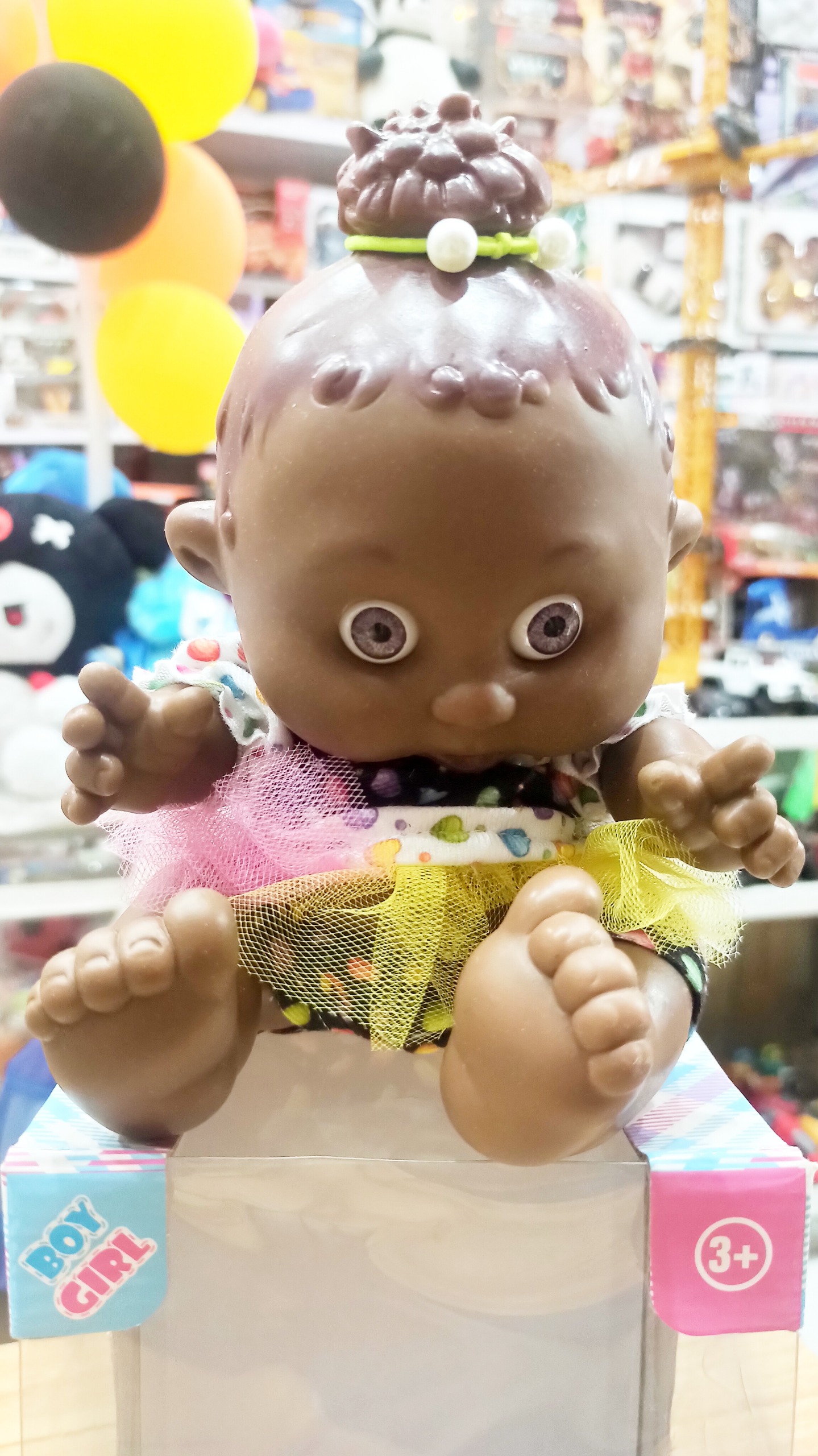 عروسک سیاه نشسته